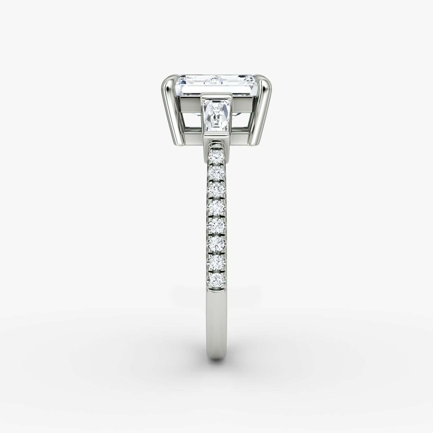 The Tapered Baguette Three Stone | Emerald | Platinum | bandAccent: Pavé | excludeFromFeed: null | diamondOrientation: vertical | caratWeight: other