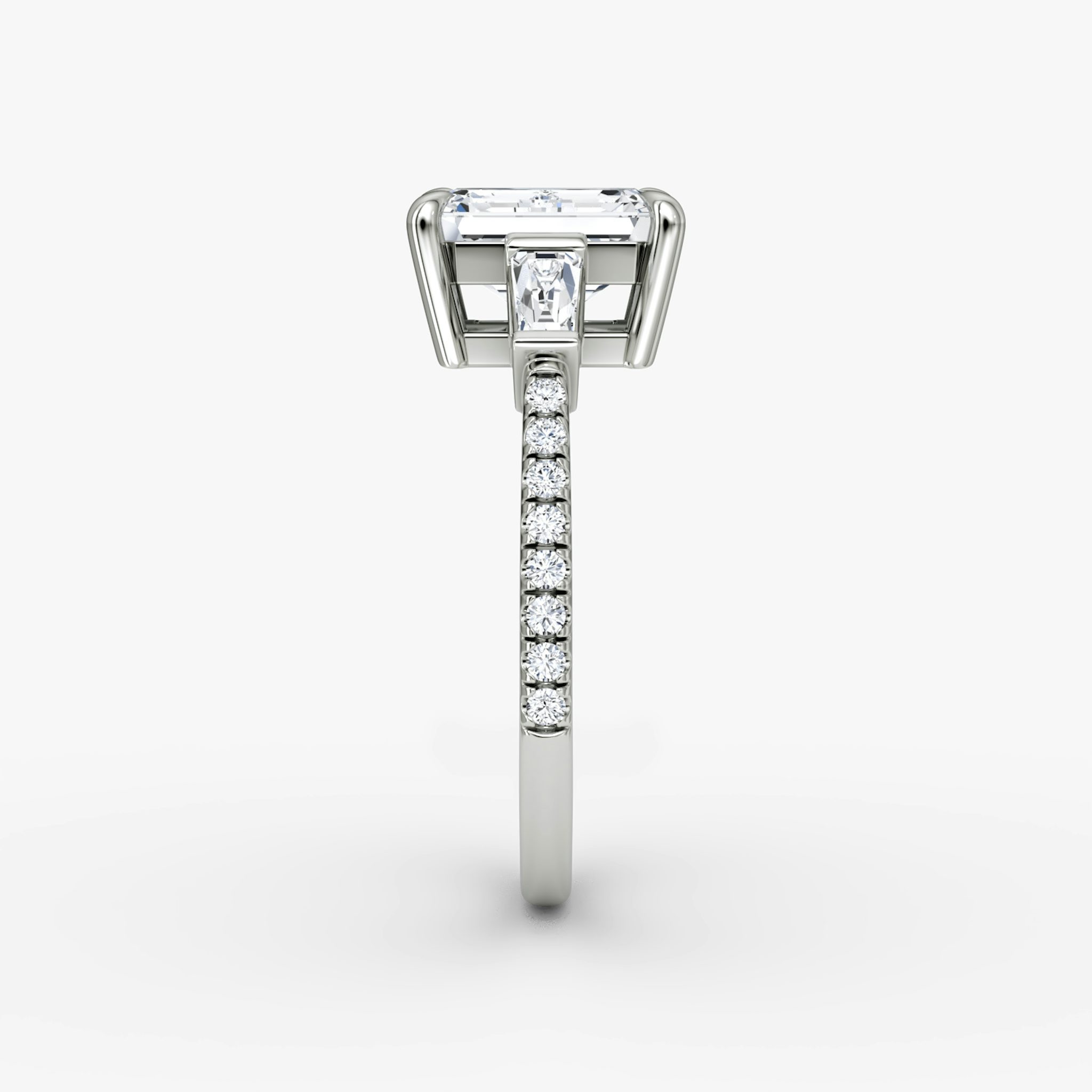 The Tapered Baguette Three Stone | Emerald | 18k | White Gold | bandAccent: Pavé | excludeFromFeed: null | diamondOrientation: vertical | caratWeight: other