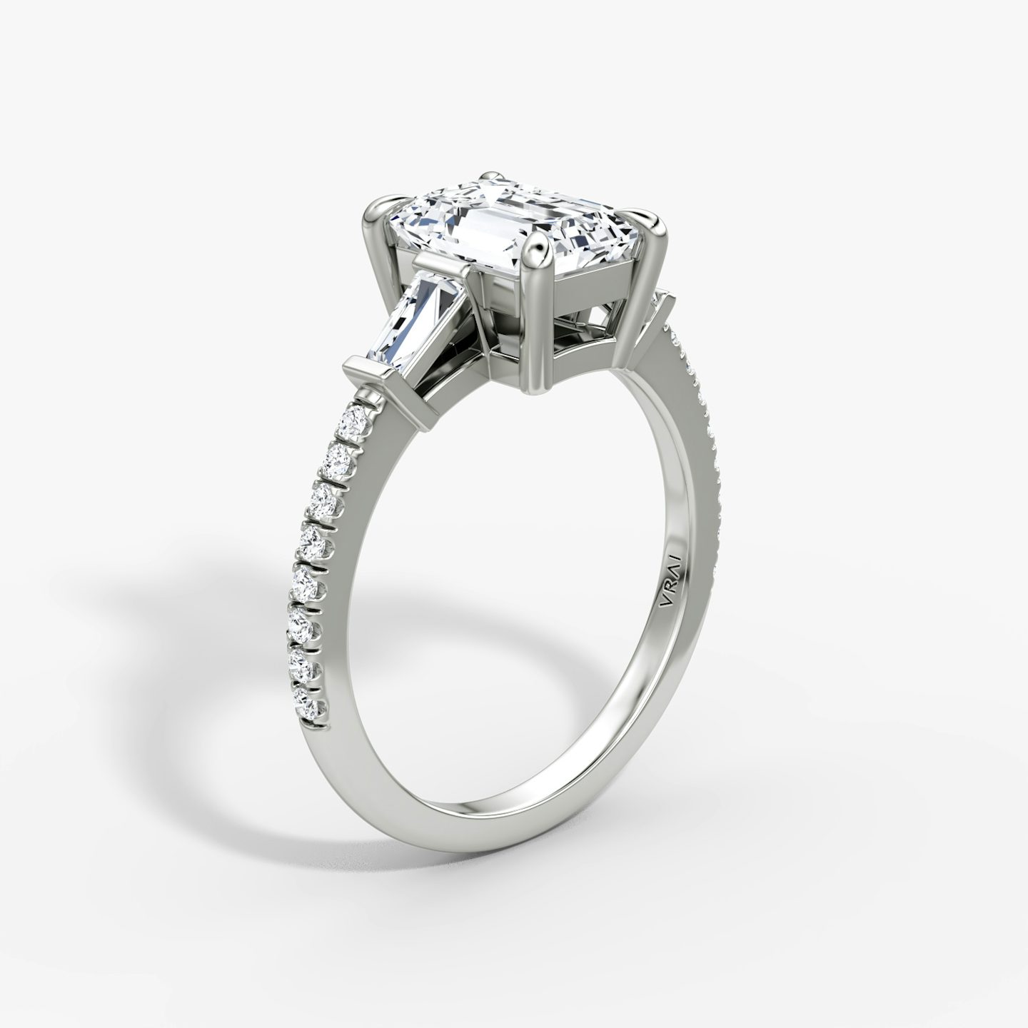 The Tapered Baguette Three Stone | Emerald | 18k | White Gold | bandAccent: Pavé | excludeFromFeed: null | diamondOrientation: vertical | caratWeight: other
