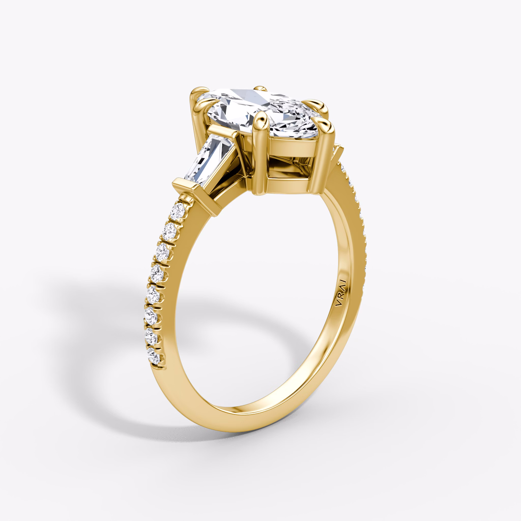 The Tapered Baguette Three Stone | Marquise | 18k | Yellow Gold | bandAccent: Pavé | excludeFromFeed: null | diamondOrientation: vertical | caratWeight: other
