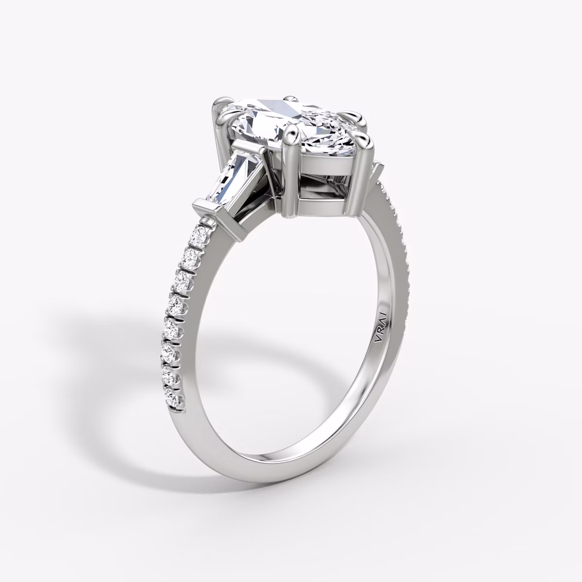 The Tapered Baguette Three Stone | Marquise | 18k | White Gold | bandAccent: Pavé | caratWeight: 1.0ct | excludeFromFeed: null | diamondOrientation: vertical