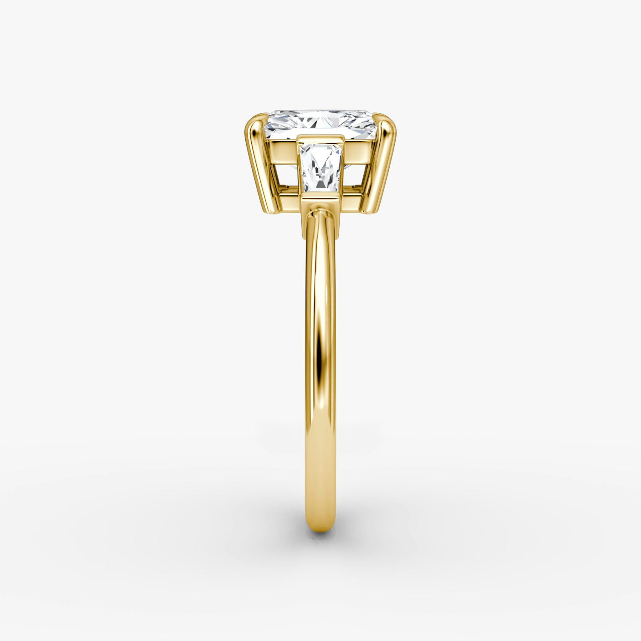 The Tapered Baguette Three Stone | Radiant | 18k | Yellow Gold | bandAccent: Plain | excludeFromFeed: null | diamondOrientation: vertical | caratWeight: other