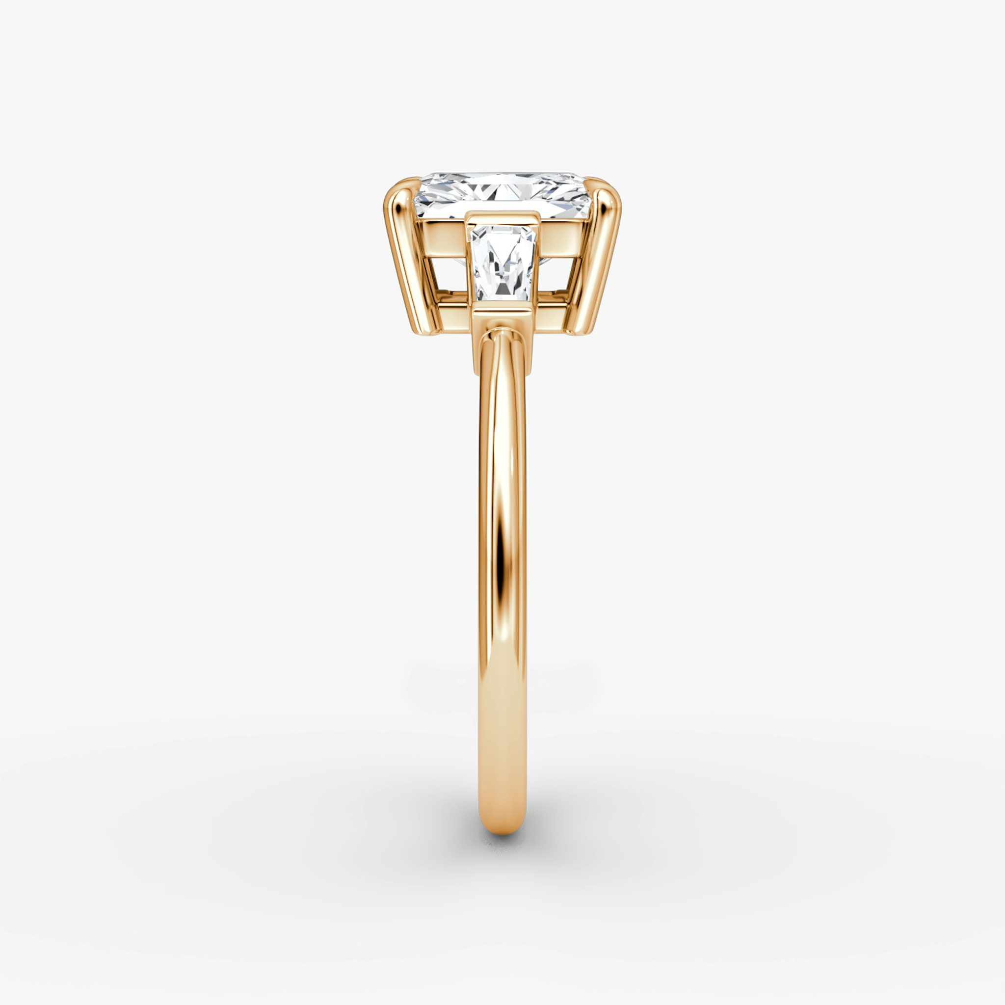 The Tapered Baguette Three Stone | Radiant | 14k | Rose Gold | bandAccent: Plain | excludeFromFeed: null | diamondOrientation: vertical | caratWeight: other