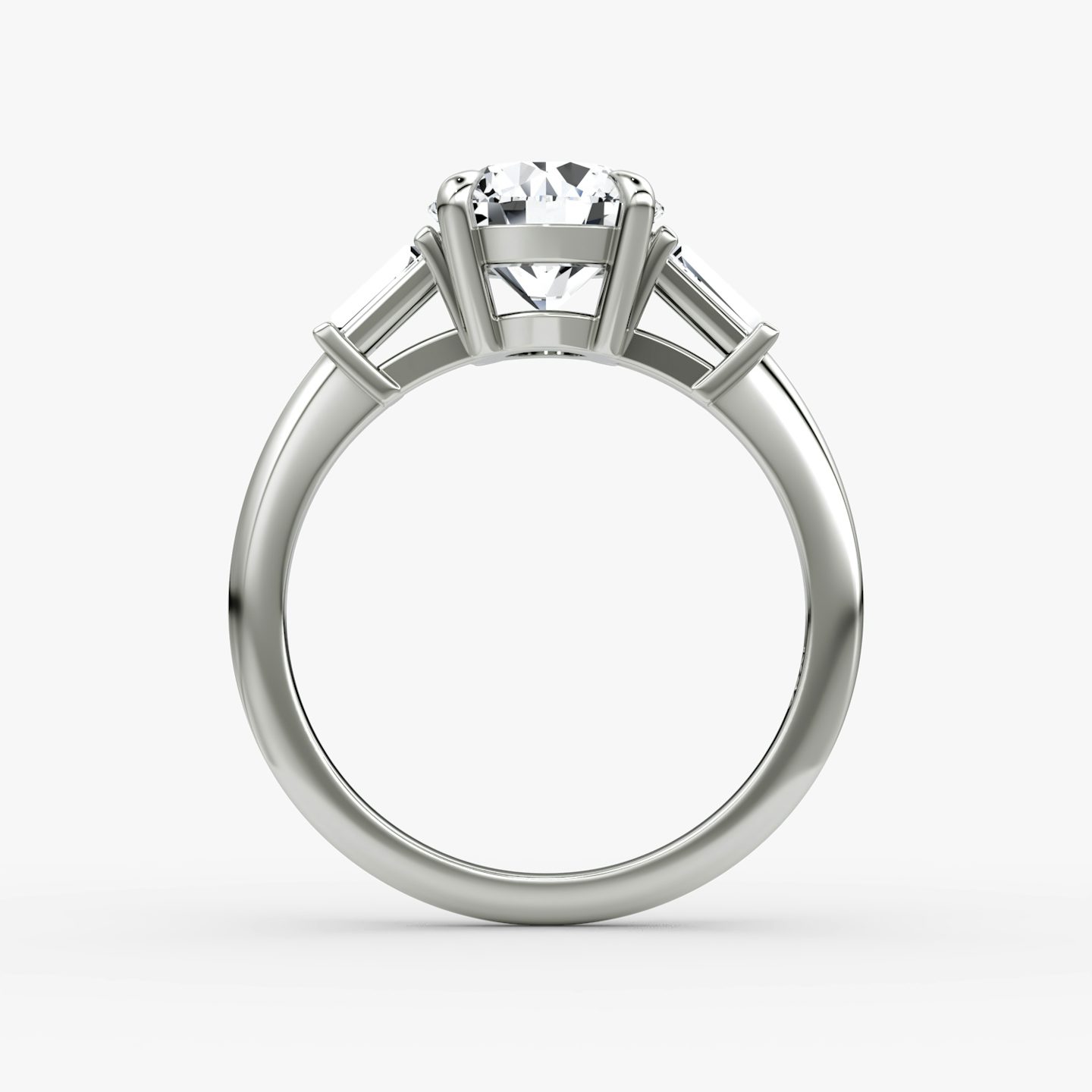 The Tapered Baguette Three Stone | Round Brilliant | Platinum | bandAccent: Plain | caratWeight: 1.5ct | excludeFromFeed: null | diamondOrientation: vertical