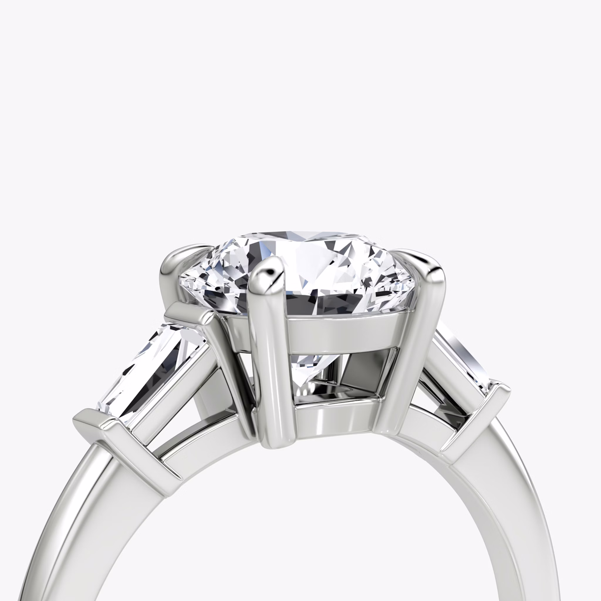 The Tapered Baguette Three Stone | Round Brilliant | 18k | White Gold | bandAccent: Plain | caratWeight: 1.5ct | excludeFromFeed: null | diamondOrientation: vertical
