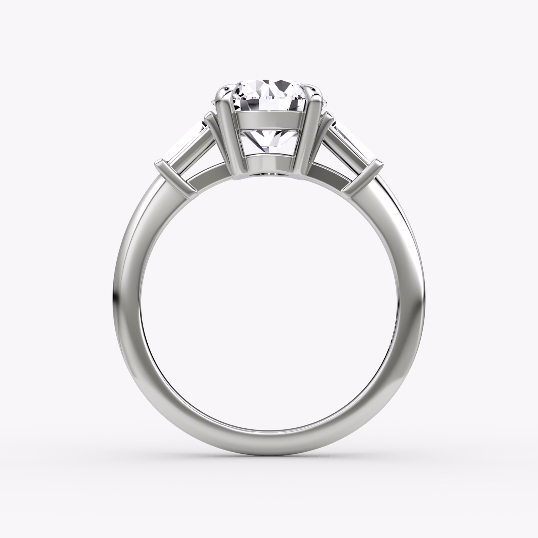 The Tapered Baguette Three Stone | Round Brilliant | 18k | White Gold | bandAccent: Plain | caratWeight: 1.5ct | excludeFromFeed: null | diamondOrientation: vertical