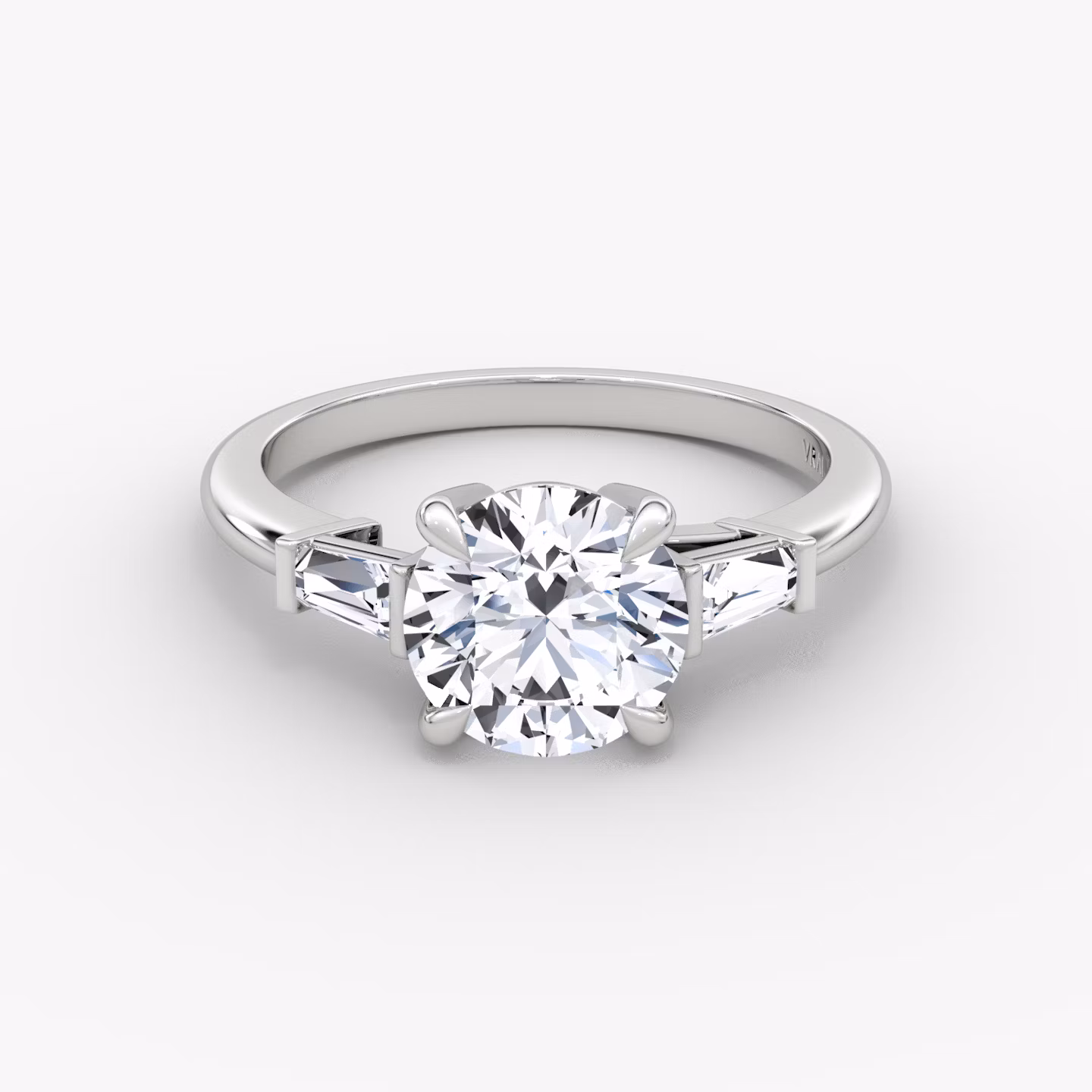The Tapered Baguette Three Stone | Round Brilliant | 18k | White Gold | bandAccent: Plain | caratWeight: other | excludeFromFeed: null | diamondOrientation: vertical