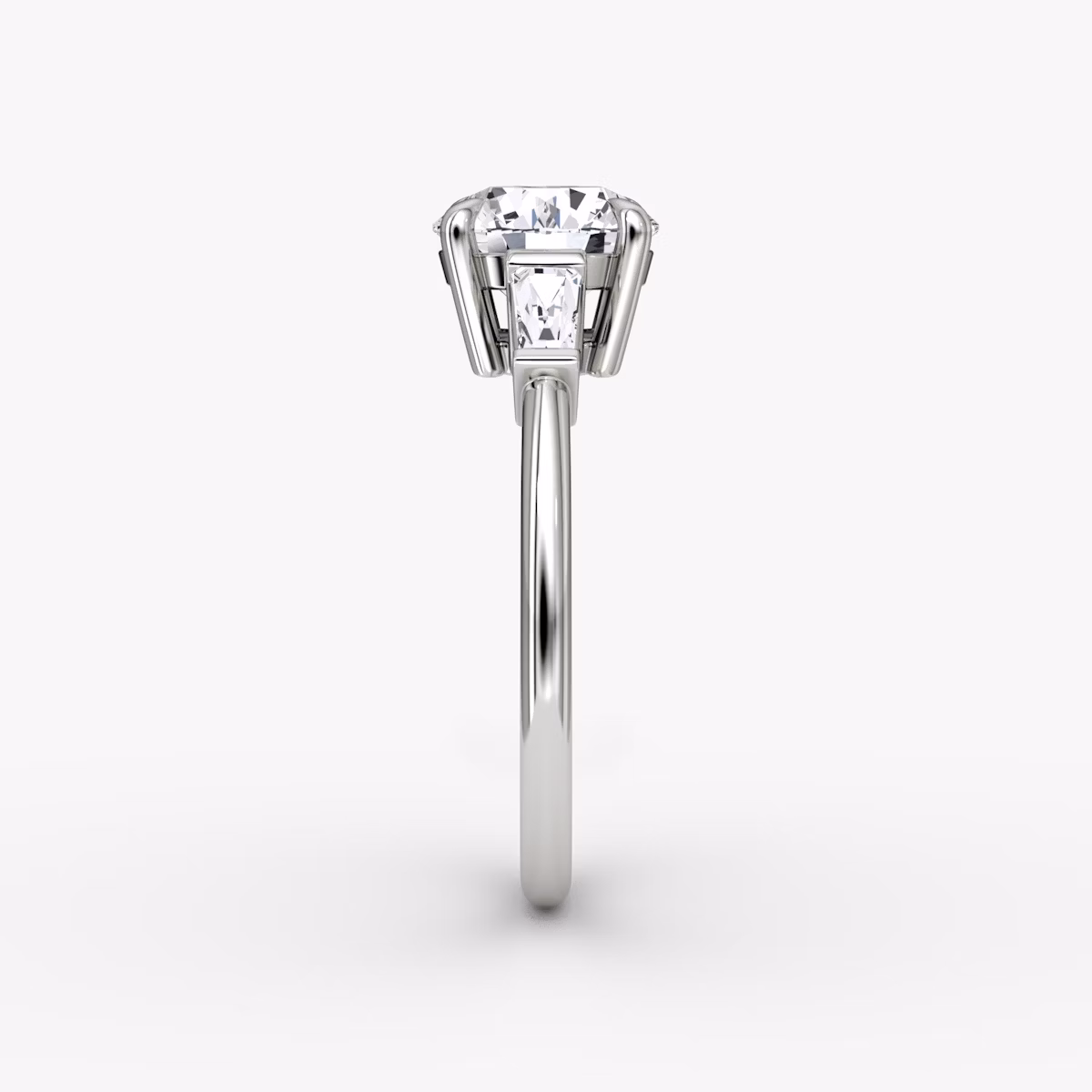 The Tapered Baguette Three Stone | Round Brilliant | Platinum | bandAccent: Plain | caratWeight: other | excludeFromFeed: null | diamondOrientation: vertical