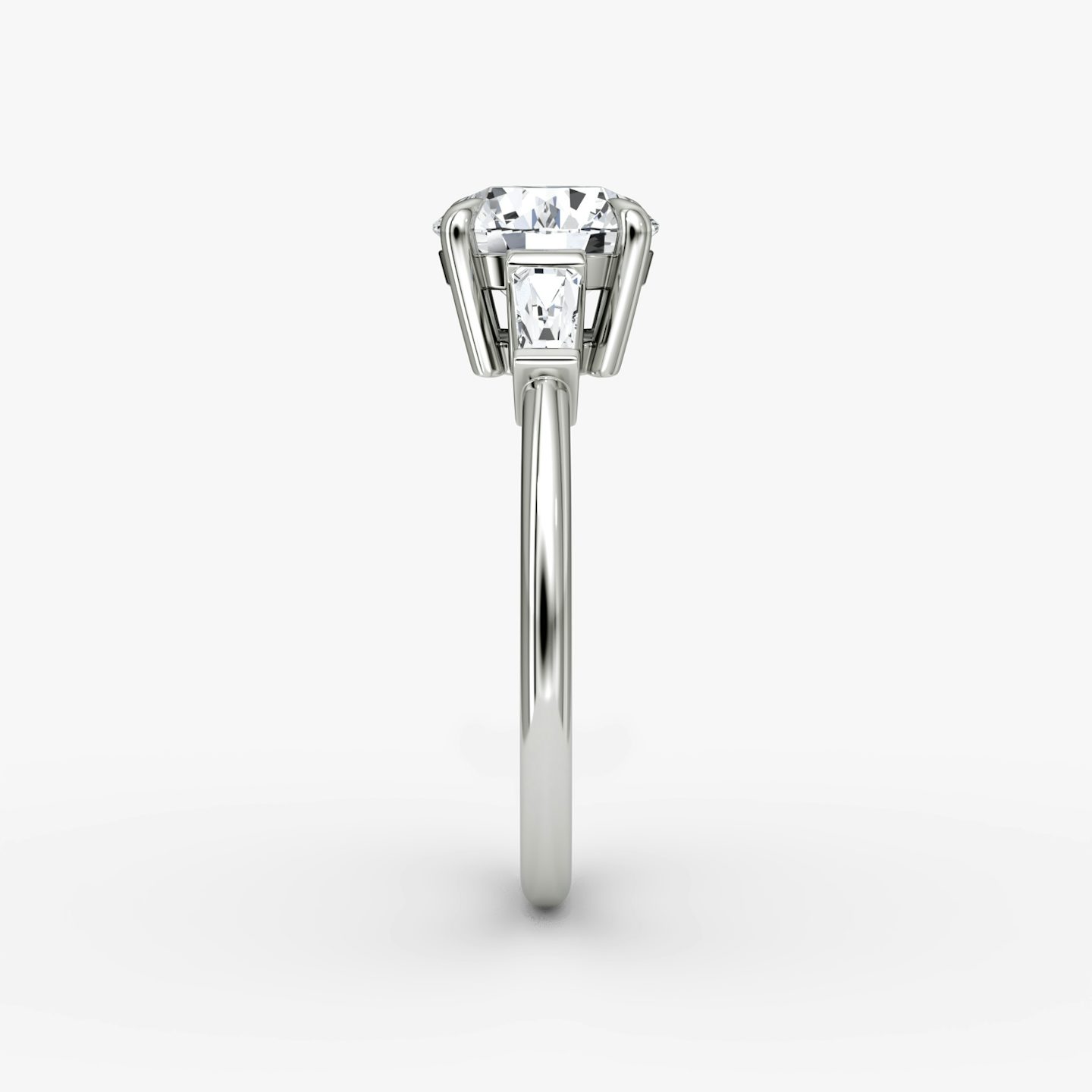 The Tapered Baguette Three Stone | Round Brilliant | Platinum | bandAccent: Plain | caratWeight: other | excludeFromFeed: null | diamondOrientation: vertical