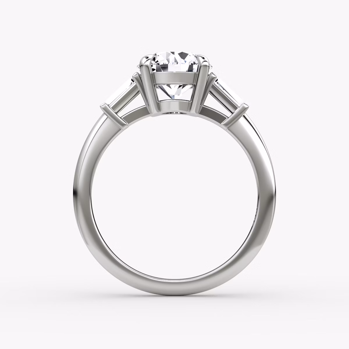 The Tapered Baguette Three Stone | Round Brilliant | Platinum | bandAccent: Plain | caratWeight: other | excludeFromFeed: null | diamondOrientation: vertical