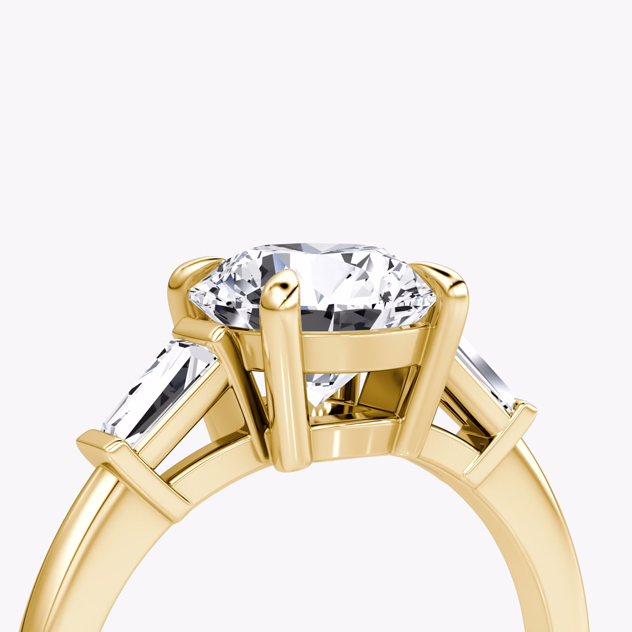 The Tapered Baguette Three Stone | Round Brilliant | 18k | Yellow Gold | bandAccent: Plain | caratWeight: 1.5ct | excludeFromFeed: null | diamondOrientation: vertical