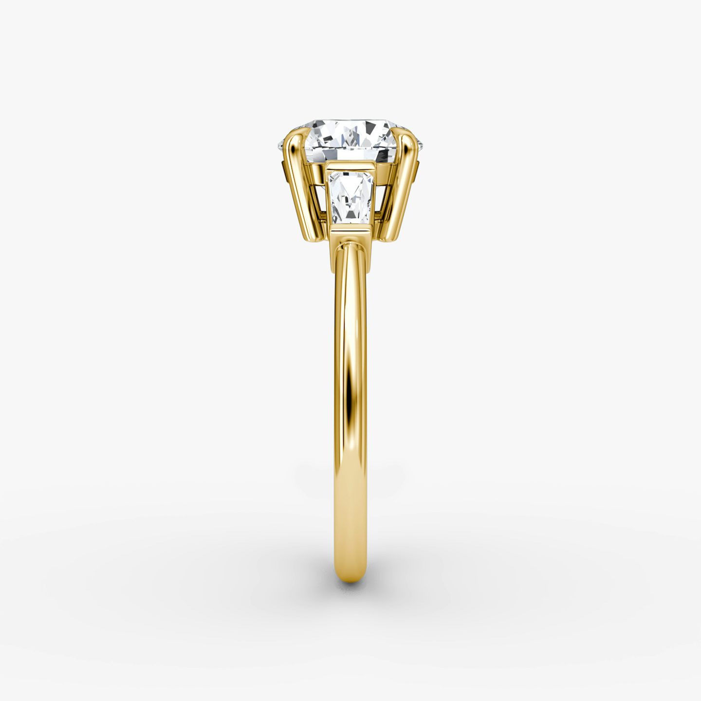 The Tapered Baguette Three Stone | Round Brilliant | 18k | Yellow Gold | bandAccent: Plain | caratWeight: 1.5ct | excludeFromFeed: null | diamondOrientation: vertical