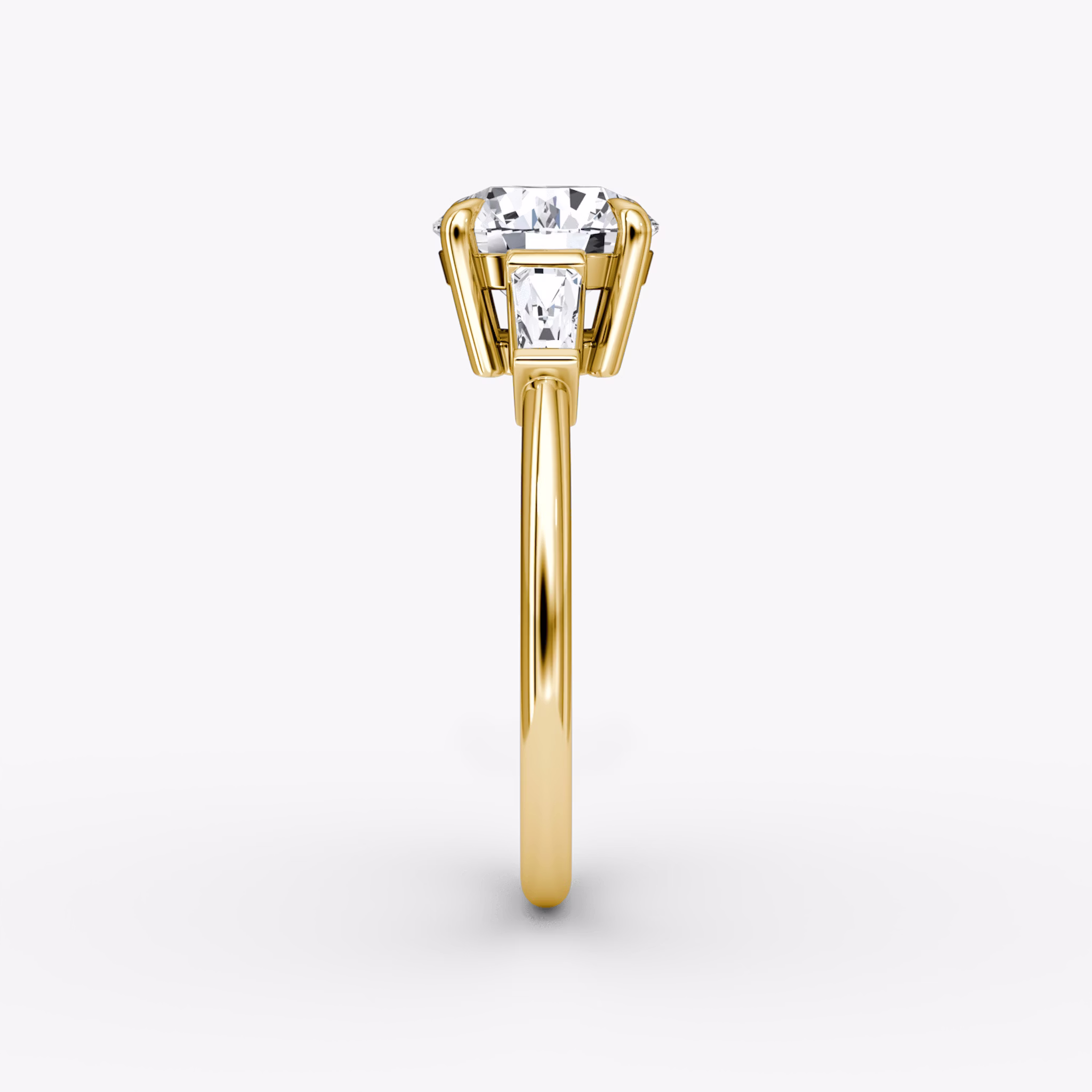 The Tapered Baguette Three Stone | Round Brilliant | 18k | Yellow Gold | bandAccent: Plain | caratWeight: other | excludeFromFeed: null | diamondOrientation: vertical