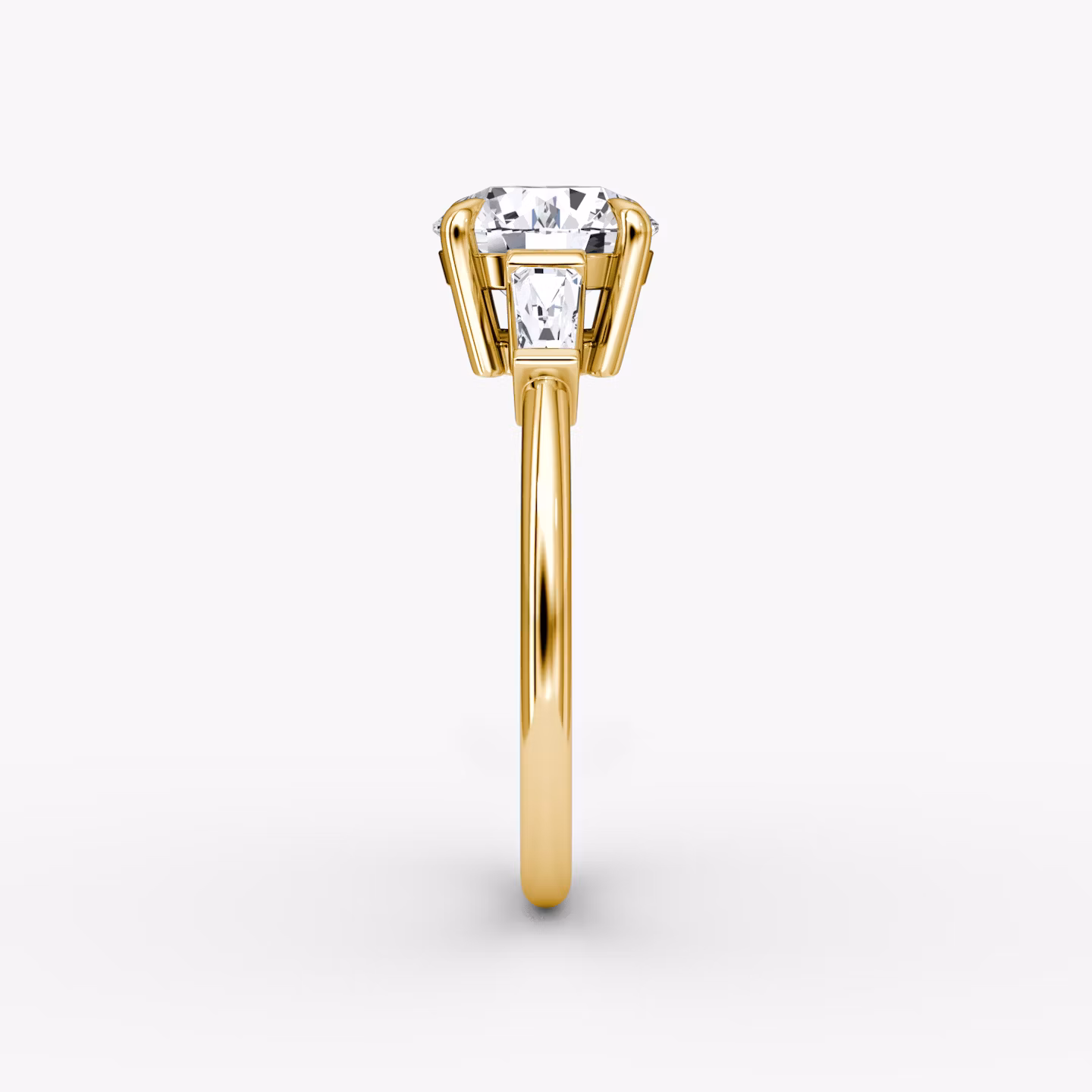 The Tapered Baguette Three Stone | Round Brilliant | 18k | Yellow Gold | bandAccent: Plain | caratWeight: other | excludeFromFeed: null | diamondOrientation: vertical