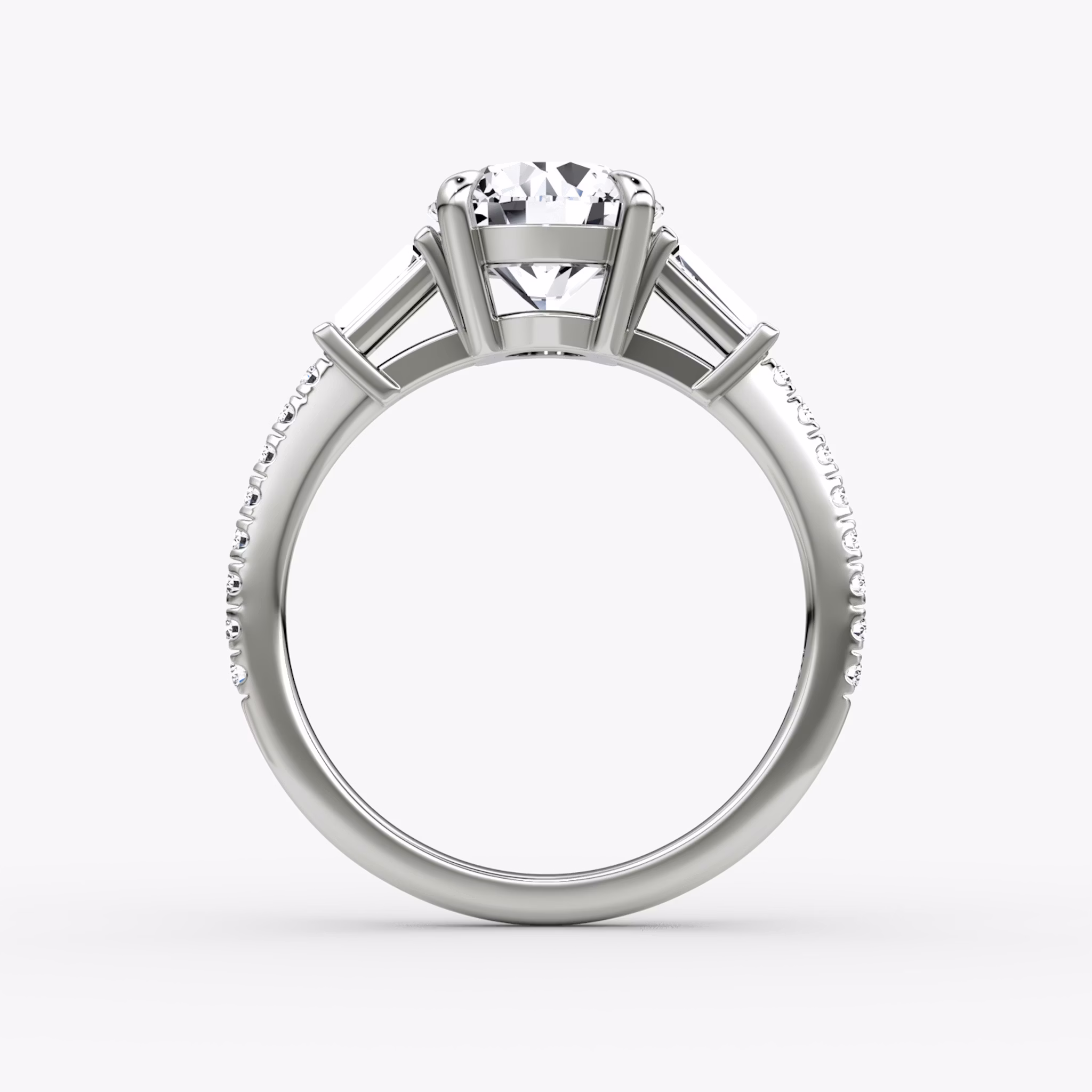 The Tapered Baguette Three Stone | Round Brilliant | 18k | White Gold | bandAccent: Pavé | caratWeight: 1.5ct | excludeFromFeed: null | diamondOrientation: vertical