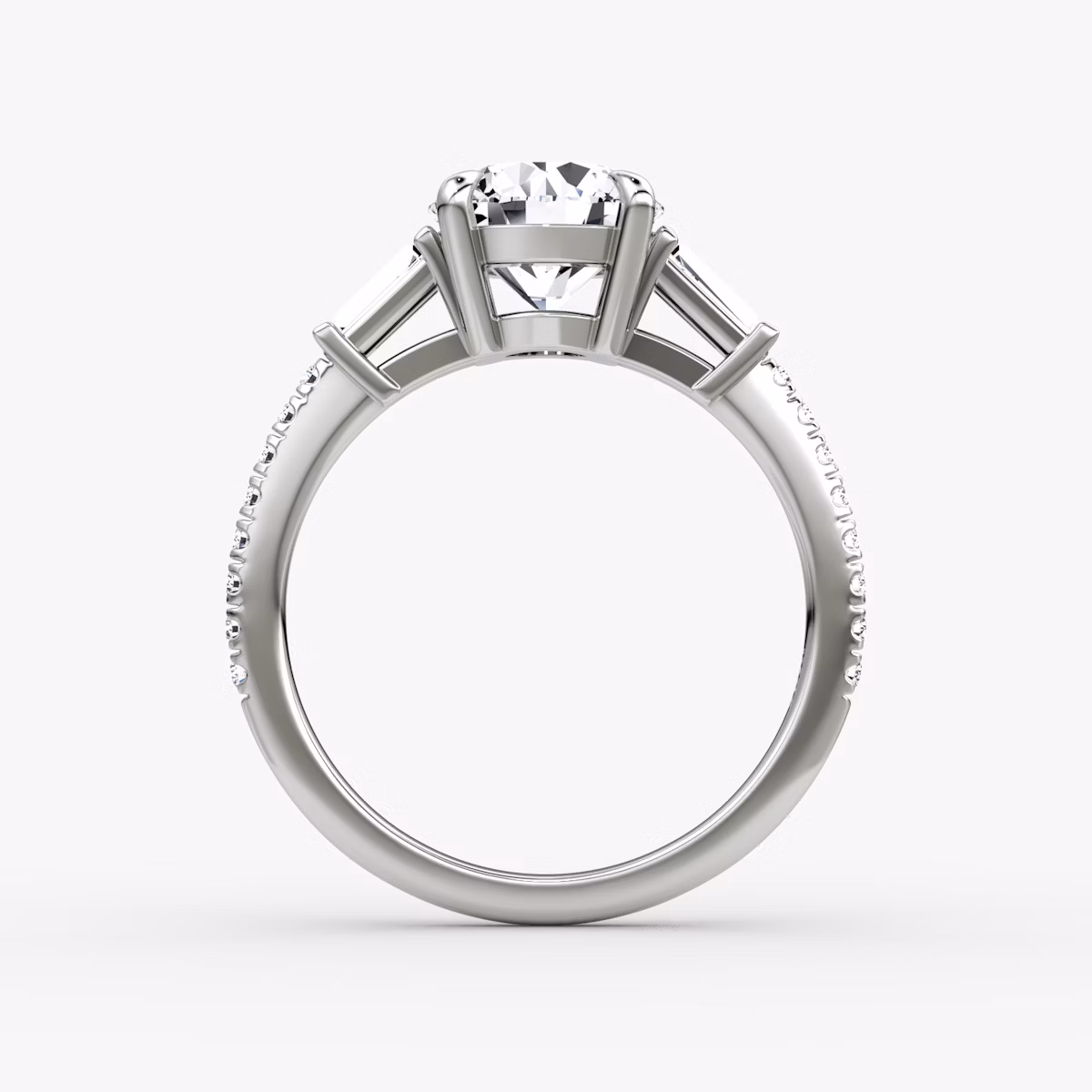 The Tapered Baguette Three Stone | Round Brilliant | Platinum | bandAccent: Pavé | caratWeight: other | excludeFromFeed: null | diamondOrientation: vertical