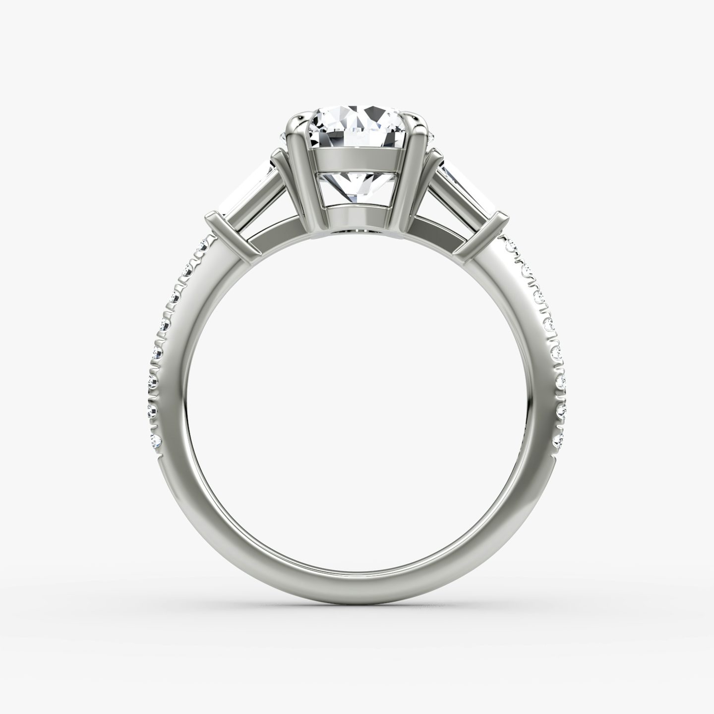 The Tapered Baguette Three Stone | Round Brilliant | Platinum | bandAccent: Pavé | caratWeight: other | excludeFromFeed: null | diamondOrientation: vertical