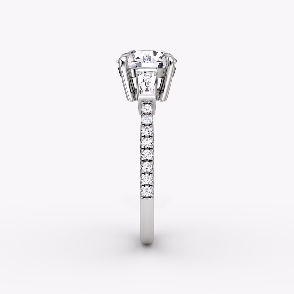 The Tapered Baguette Three Stone | Round Brilliant | Platinum | bandAccent: Pavé | caratWeight: other | excludeFromFeed: null | diamondOrientation: vertical