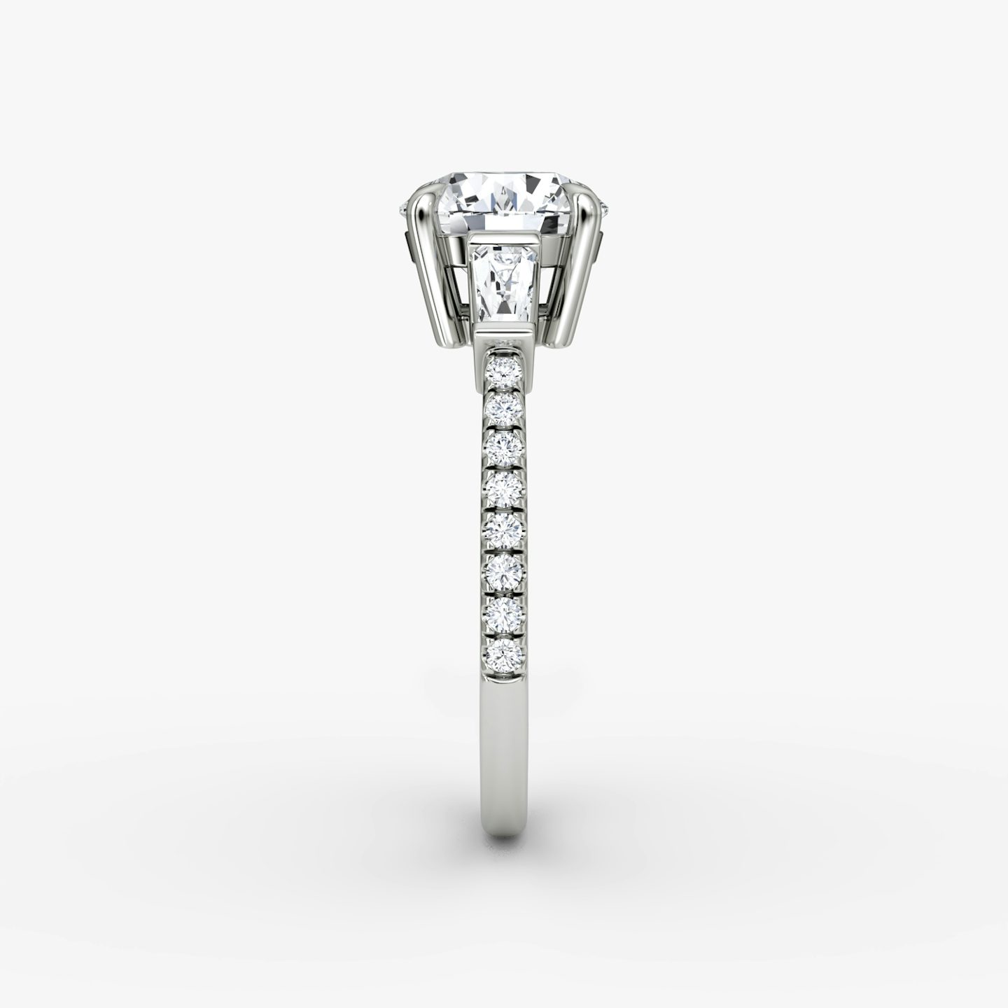 The Tapered Baguette Three Stone | Round Brilliant | Platinum | bandAccent: Pavé | caratWeight: other | excludeFromFeed: null | diamondOrientation: vertical
