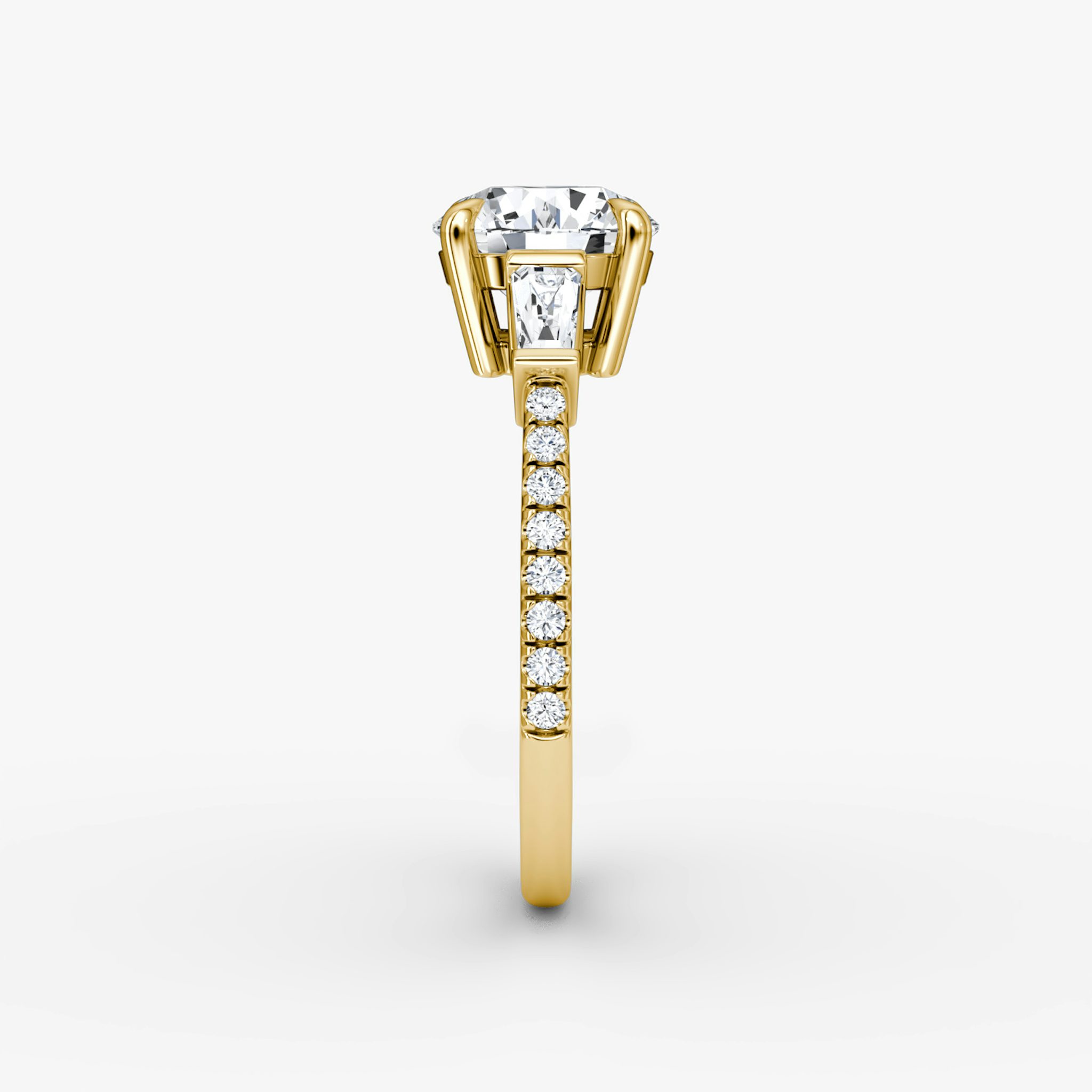 The Tapered Baguette Three Stone | Round Brilliant | 18k | Yellow Gold | bandAccent: Pavé | caratWeight: 1.0ct | excludeFromFeed: null | diamondOrientation: vertical