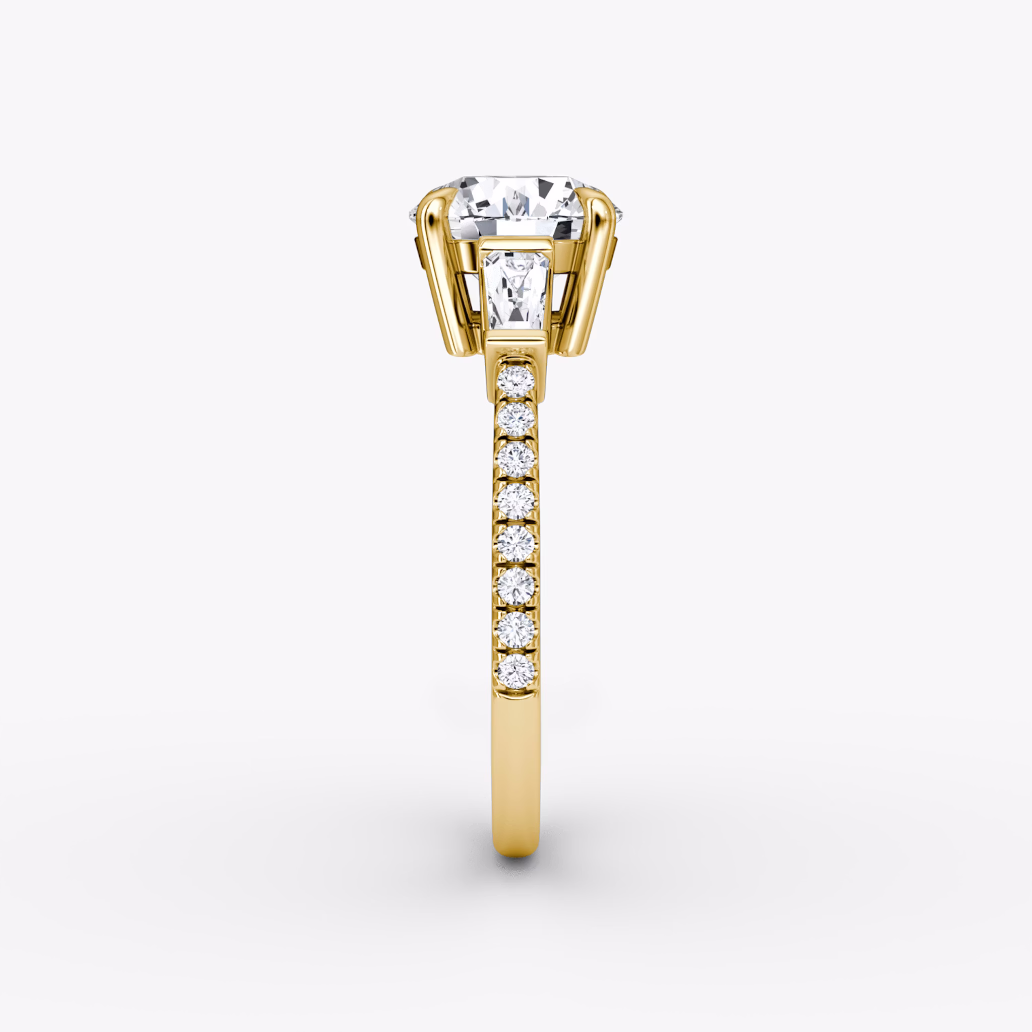 The Tapered Baguette Three Stone | Round Brilliant | 18k | Yellow Gold | bandAccent: Pavé | caratWeight: 2.0ct | excludeFromFeed: null | diamondOrientation: vertical
