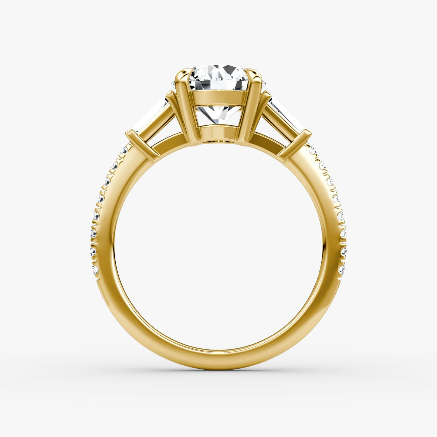 The Tapered Baguette Three Stone | Round Brilliant | 18k | Yellow Gold | bandAccent: Pavé | caratWeight: 1.5ct | excludeFromFeed: null | diamondOrientation: vertical
