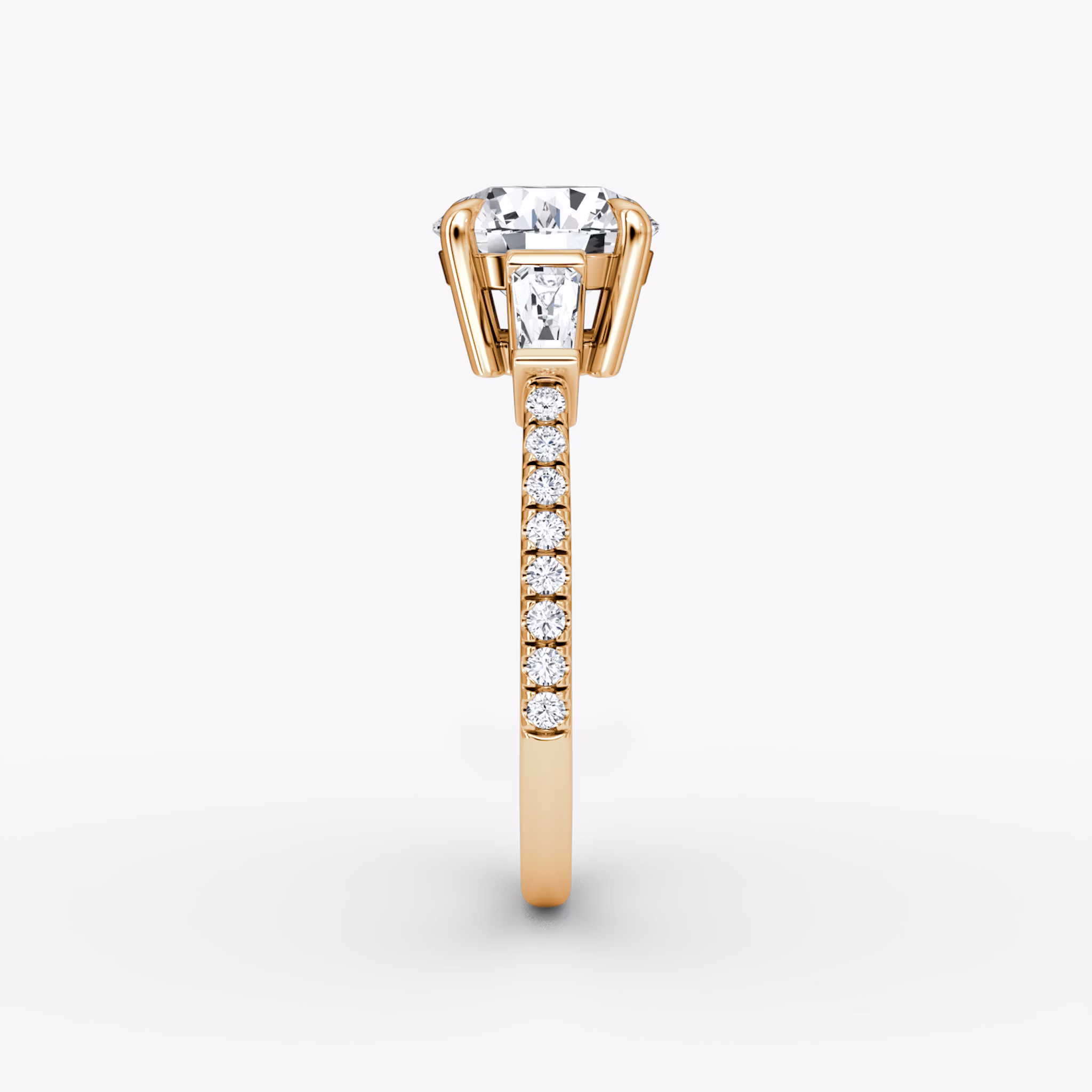 The Tapered Baguette Three Stone | Round Brilliant | 14k | Rose Gold | bandAccent: Pavé | caratWeight: 1.5ct | excludeFromFeed: null | diamondOrientation: vertical