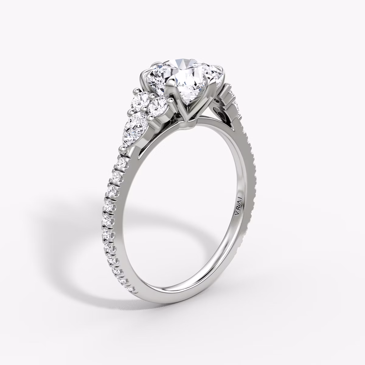 The Pear Cluster Heirloom | Cushion | Platinum | bandAccent: Pavé | diamondOrientation: vertical | caratWeight: other