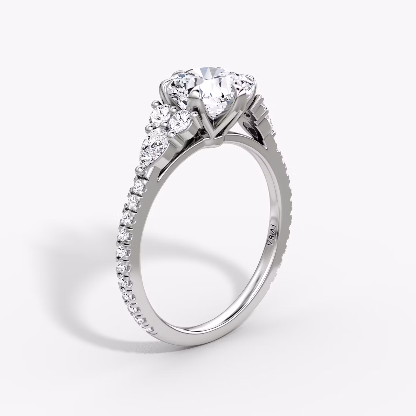 The Pear Cluster Heirloom | Cushion | Platinum | bandAccent: Pavé | diamondOrientation: vertical | caratWeight: other