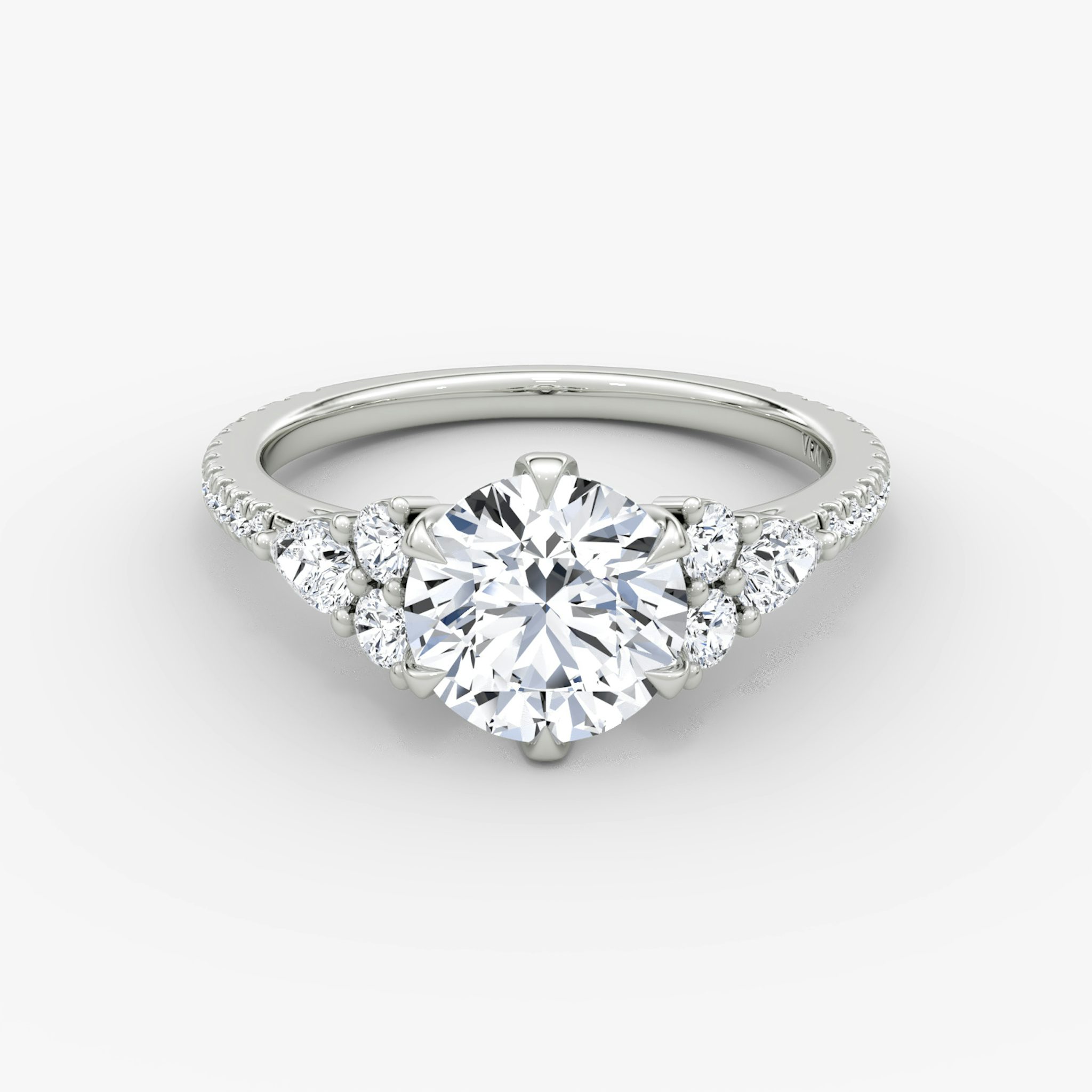 The Pear Cluster Heirloom | Round Brilliant | Platinum | bandAccent: Pavé | caratWeight: 1.5ct | diamondOrientation: vertical