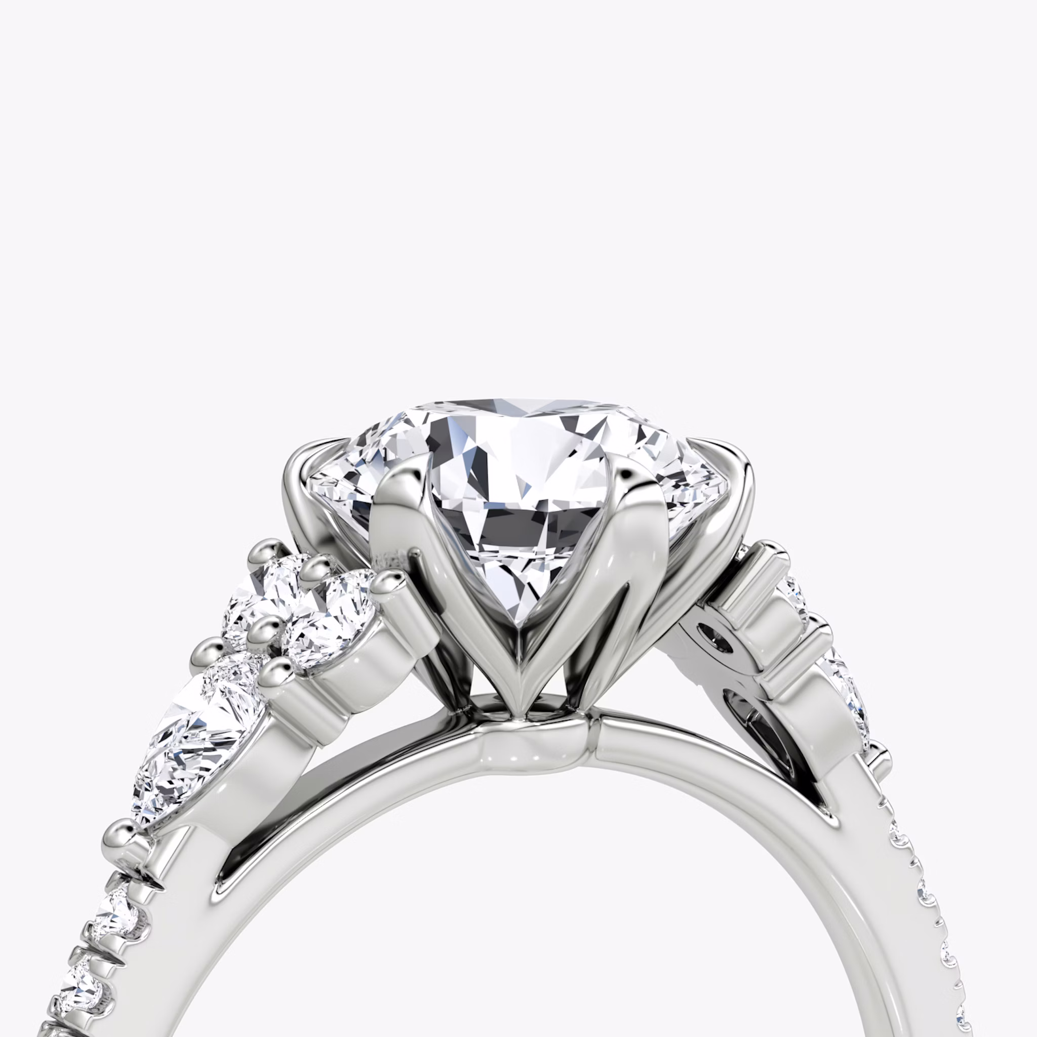 The Pear Cluster Heirloom | Round Brilliant | Platinum | bandAccent: Pavé | caratWeight: 1.5ct | diamondOrientation: vertical