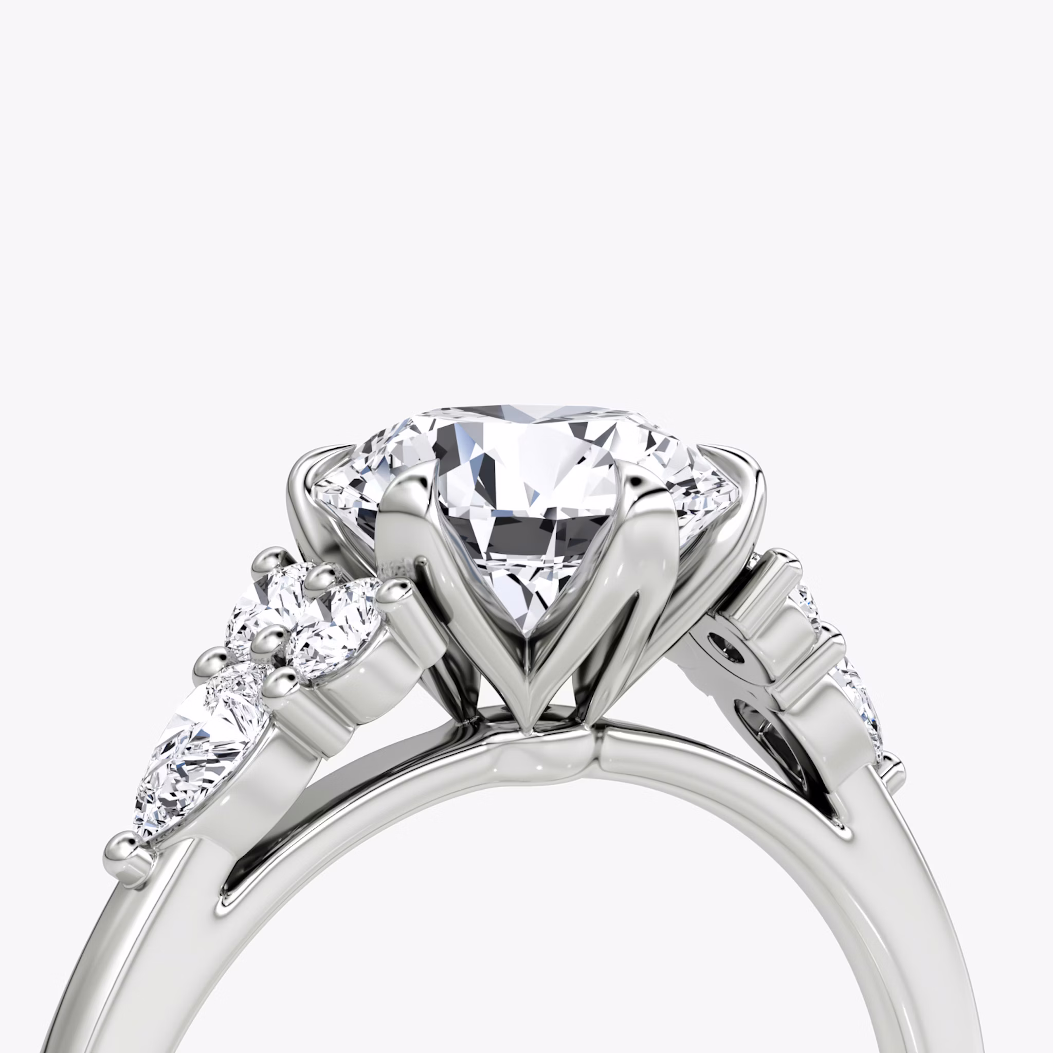 The Pear Cluster Heirloom | Round Brilliant | Platinum | bandAccent: Plain | caratWeight: 1.5ct | diamondOrientation: vertical
