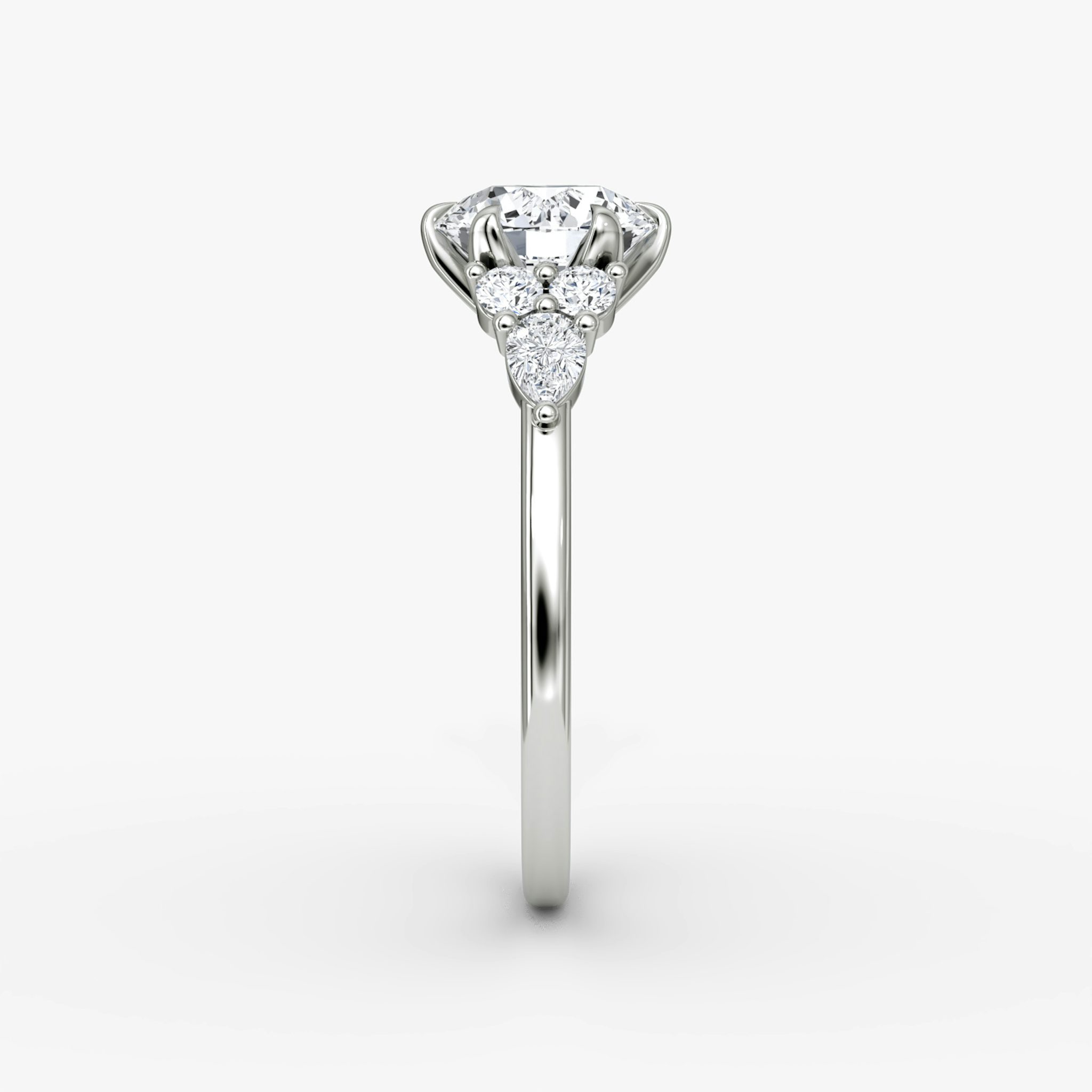 The Pear Cluster Heirloom | Round Brilliant | Platinum | bandAccent: Plain | caratWeight: 1.5ct | diamondOrientation: vertical