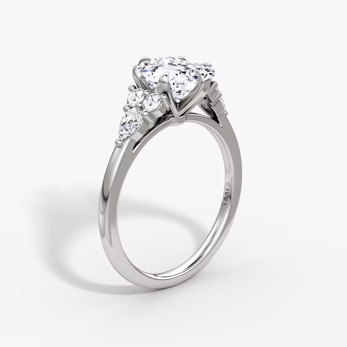 The Pear Cluster Heirloom | Emerald | Platinum | bandAccent: Plain | diamondOrientation: vertical | caratWeight: other
