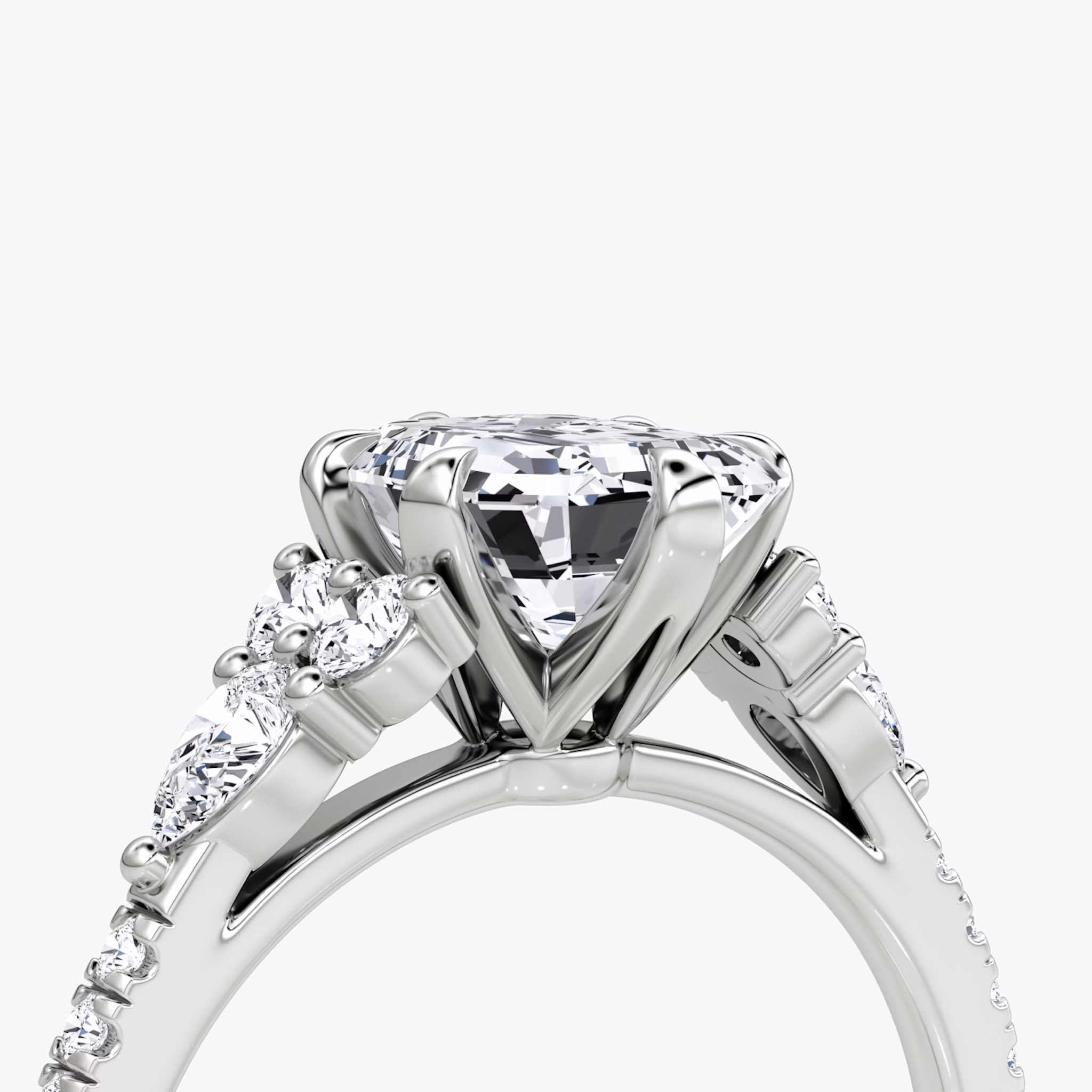 The Pear Cluster Heirloom | Emerald | Platinum | bandAccent: Pavé | diamondOrientation: vertical | caratWeight: other