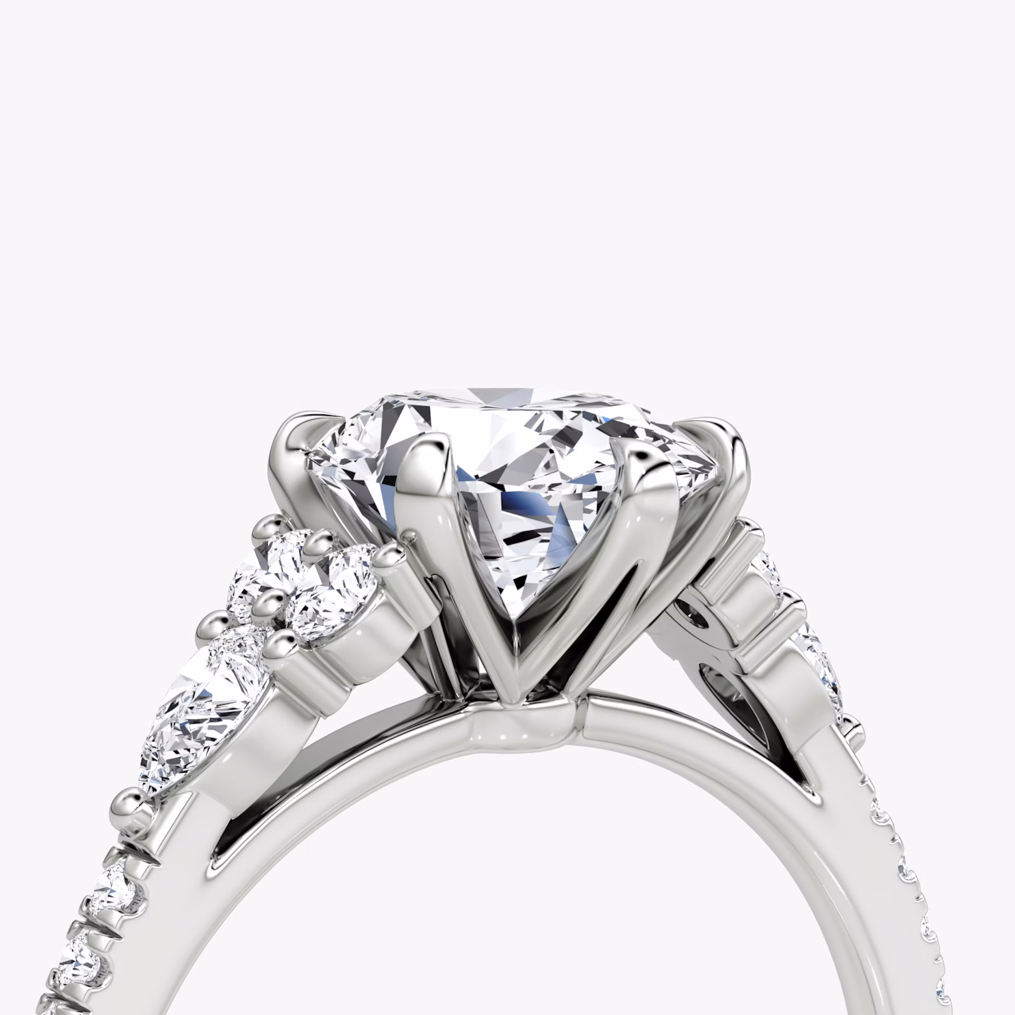 The Pear Cluster Heirloom | Oval | Platinum | bandAccent: Pavé | diamondOrientation: vertical | caratWeight: other