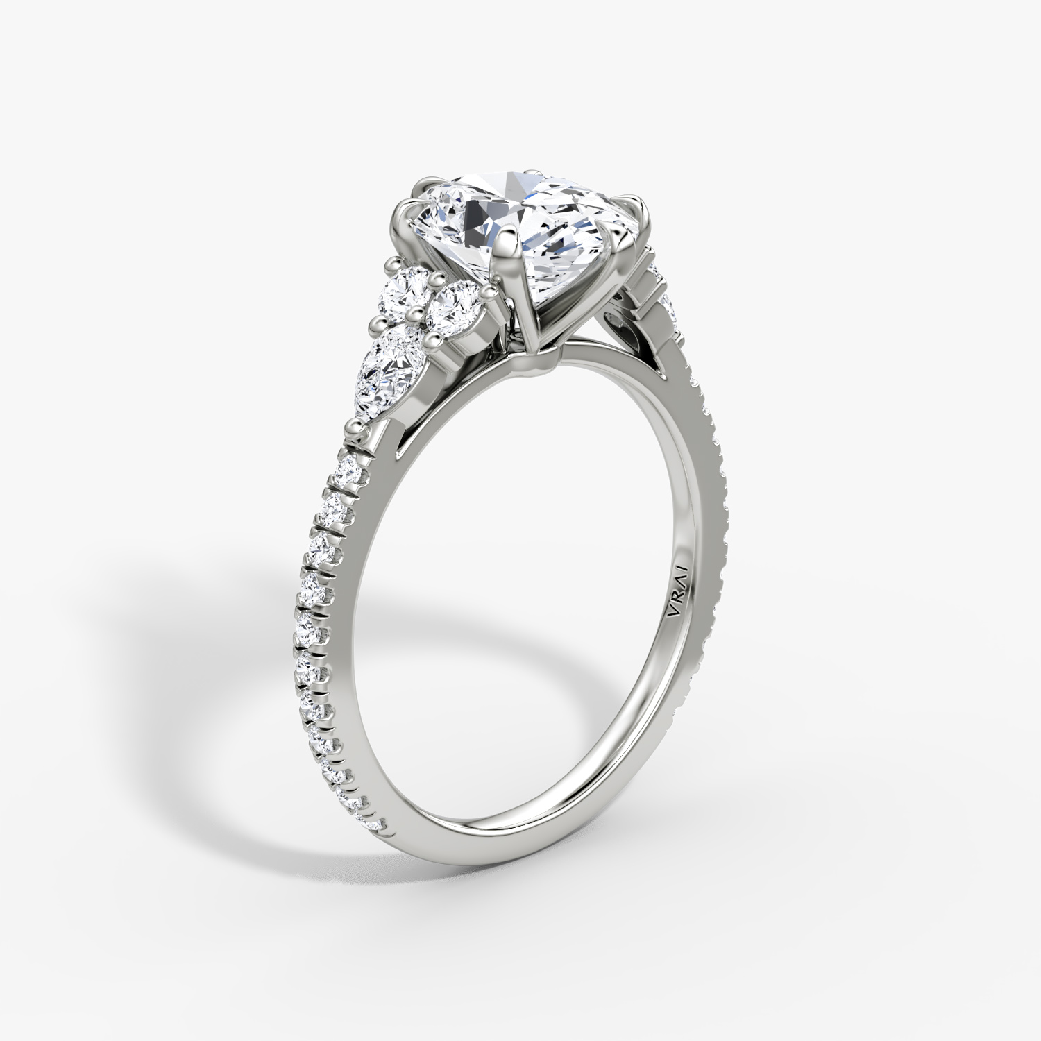 The Pear Cluster Heirloom | Oval | Platinum | bandAccent: Pavé | diamondOrientation: vertical | caratWeight: other