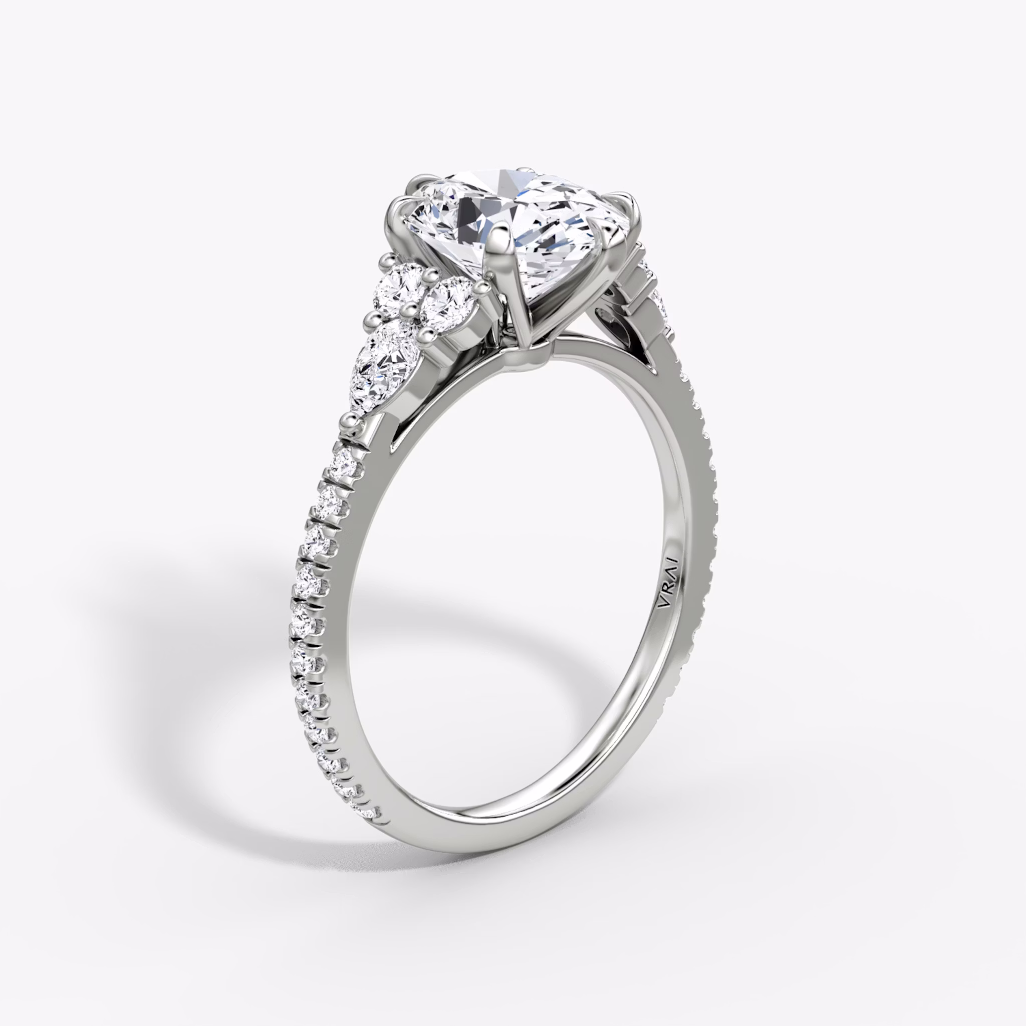 The Pear Cluster Heirloom | Oval | Platinum | bandAccent: Pavé | diamondOrientation: vertical | caratWeight: other