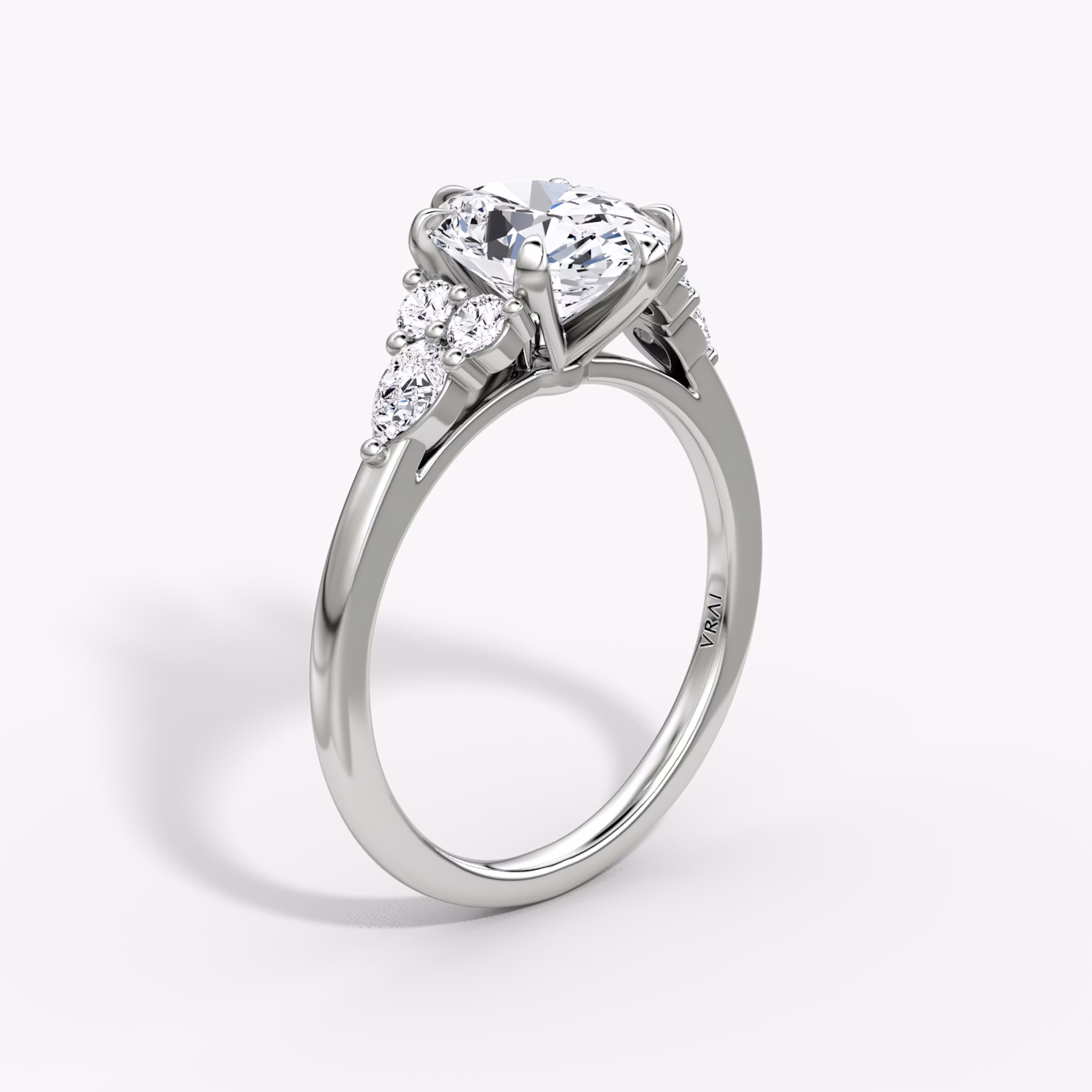 The Pear Cluster Heirloom | Oval | Platinum | bandAccent: Plain | diamondOrientation: vertical | caratWeight: other