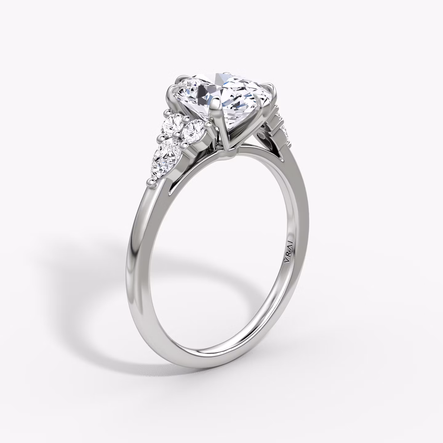 The Pear Cluster Heirloom | Oval | Platinum | bandAccent: Plain | diamondOrientation: vertical | caratWeight: other