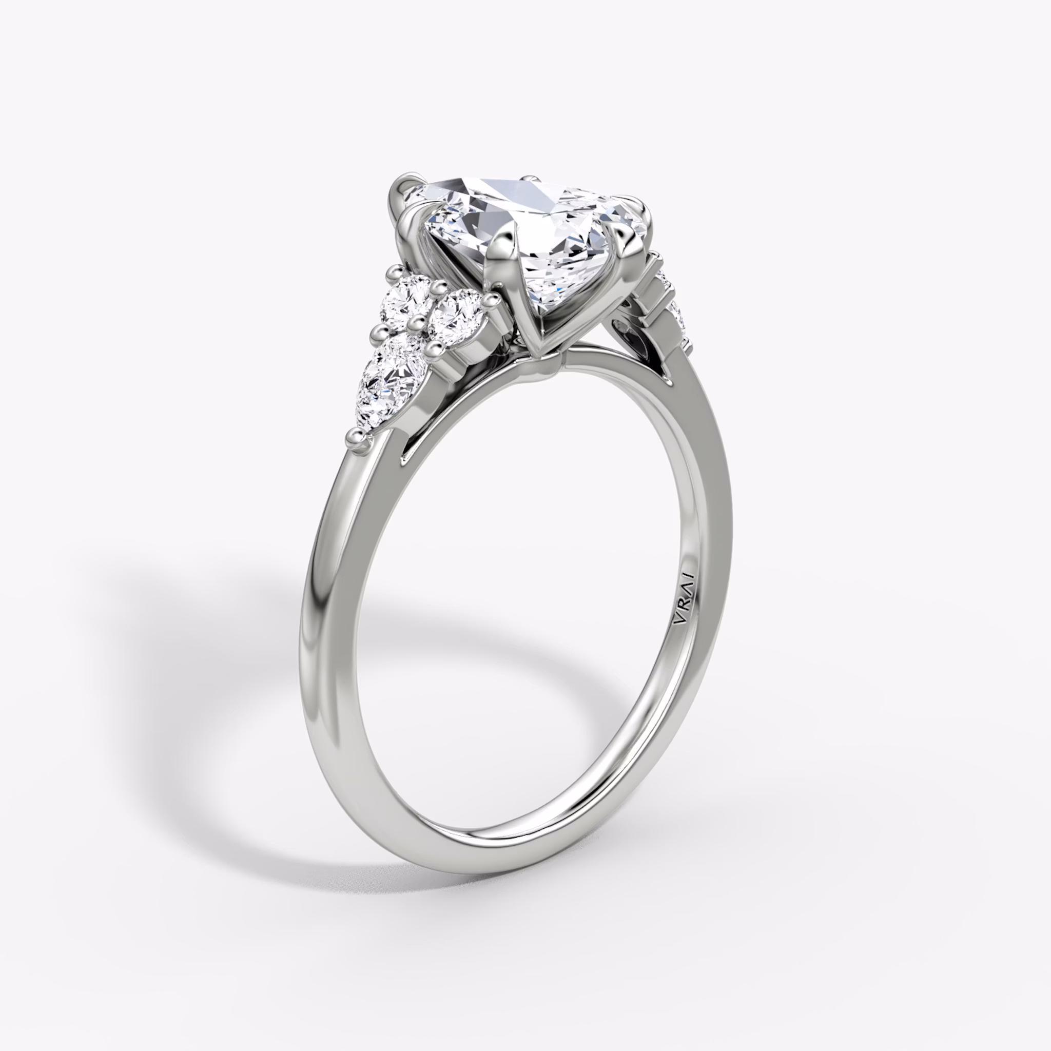 The Pear Cluster Heirloom | Pear | Platinum | bandAccent: Plain | diamondOrientation: vertical | caratWeight: other