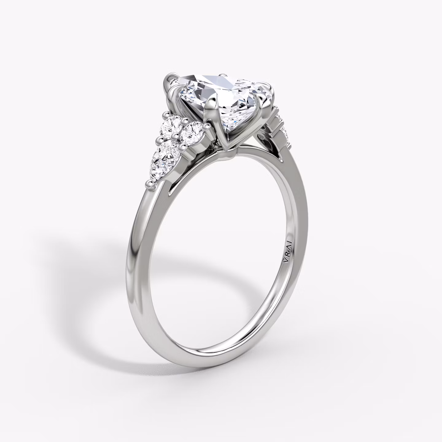 The Pear Cluster Heirloom | Pear | Platinum | bandAccent: Plain | diamondOrientation: vertical | caratWeight: other