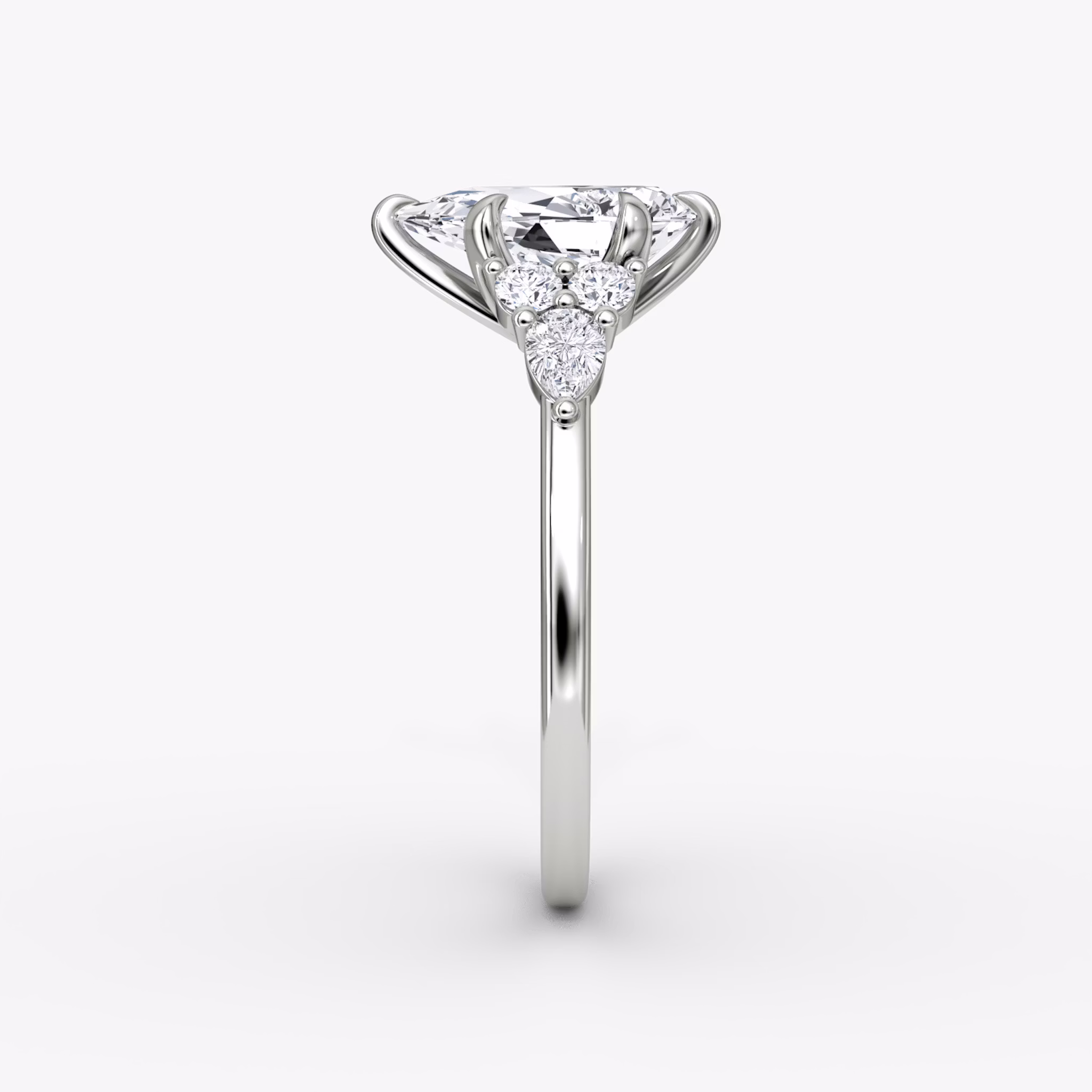 The Pear Cluster Heirloom | Pear | Platinum | bandAccent: Plain | diamondOrientation: vertical | caratWeight: other