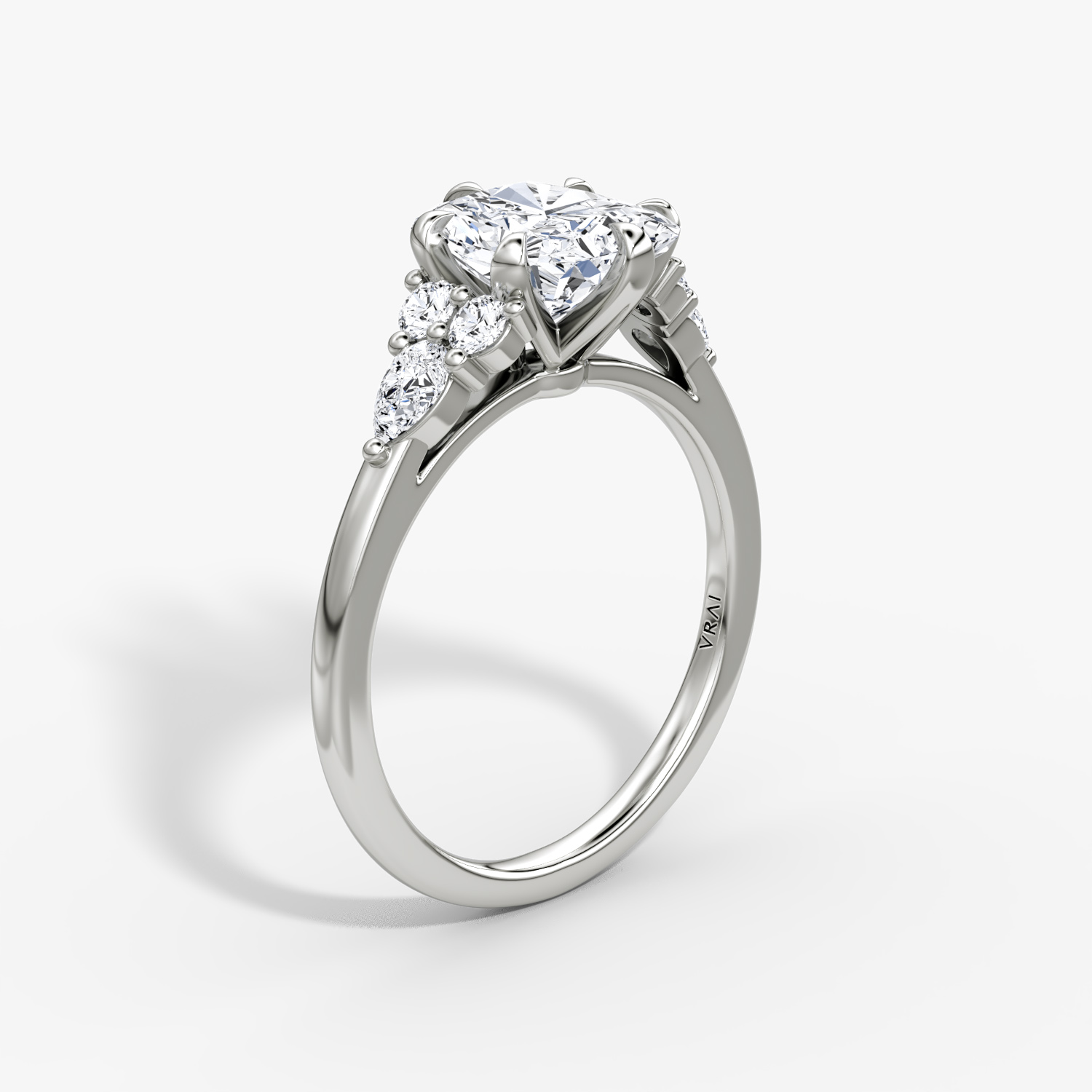 The Pear Cluster Heirloom | Radiant | Platinum | bandAccent: Plain | diamondOrientation: vertical | caratWeight: other