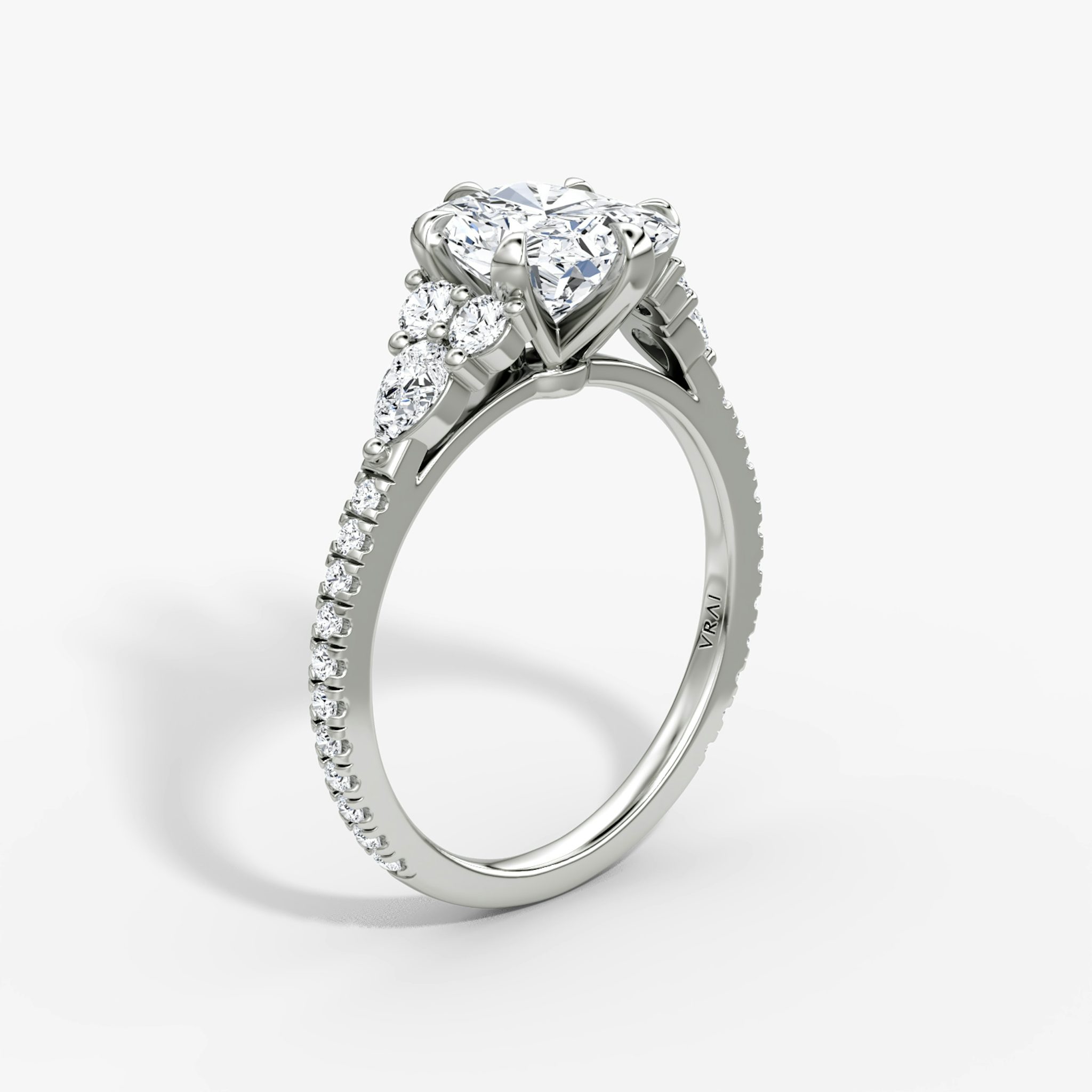 The Pear Cluster Heirloom | Radiant | Platinum | bandAccent: Pavé | diamondOrientation: vertical | caratWeight: other