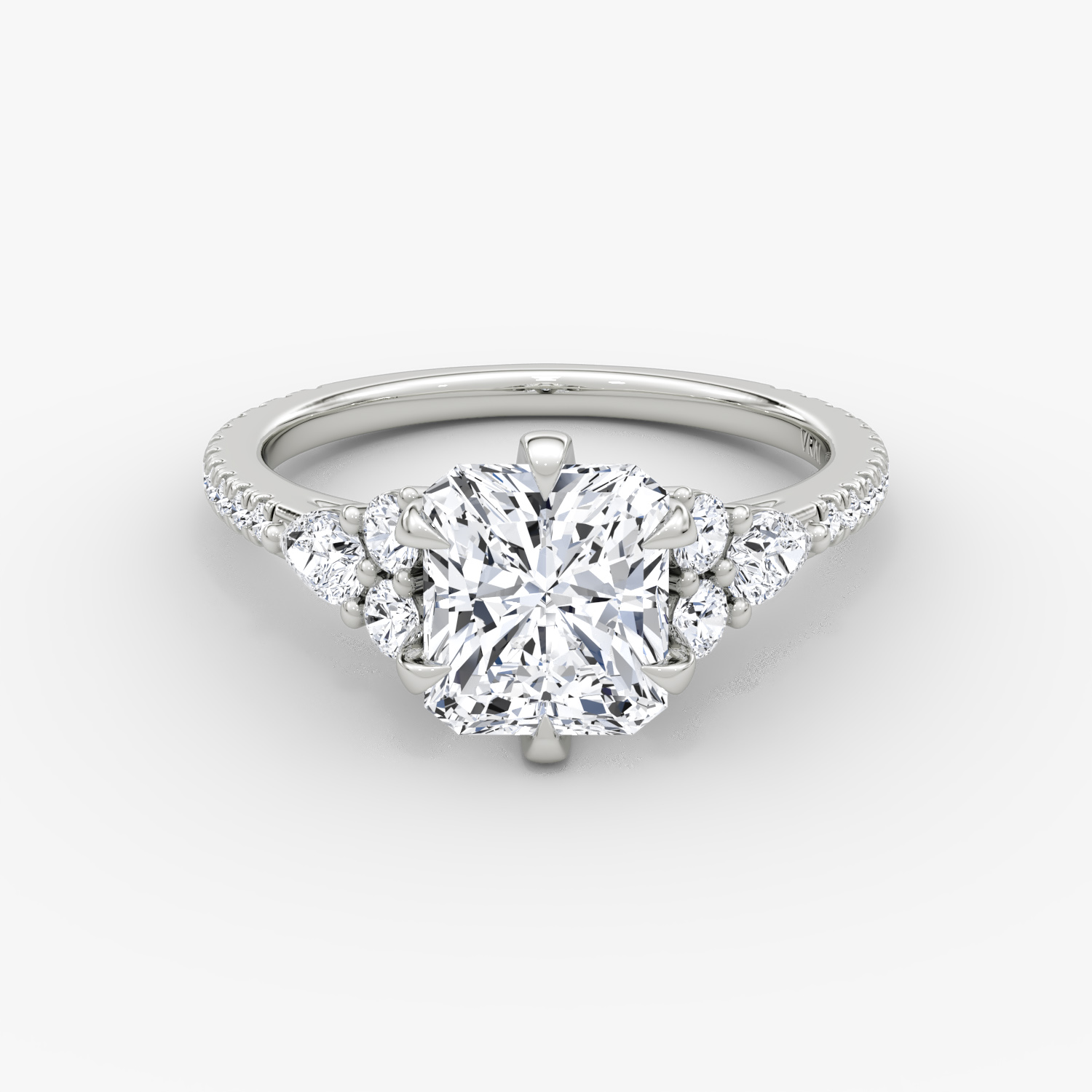 The Pear Cluster Heirloom | Radiant | Platinum | bandAccent: Pavé | diamondOrientation: vertical | caratWeight: other