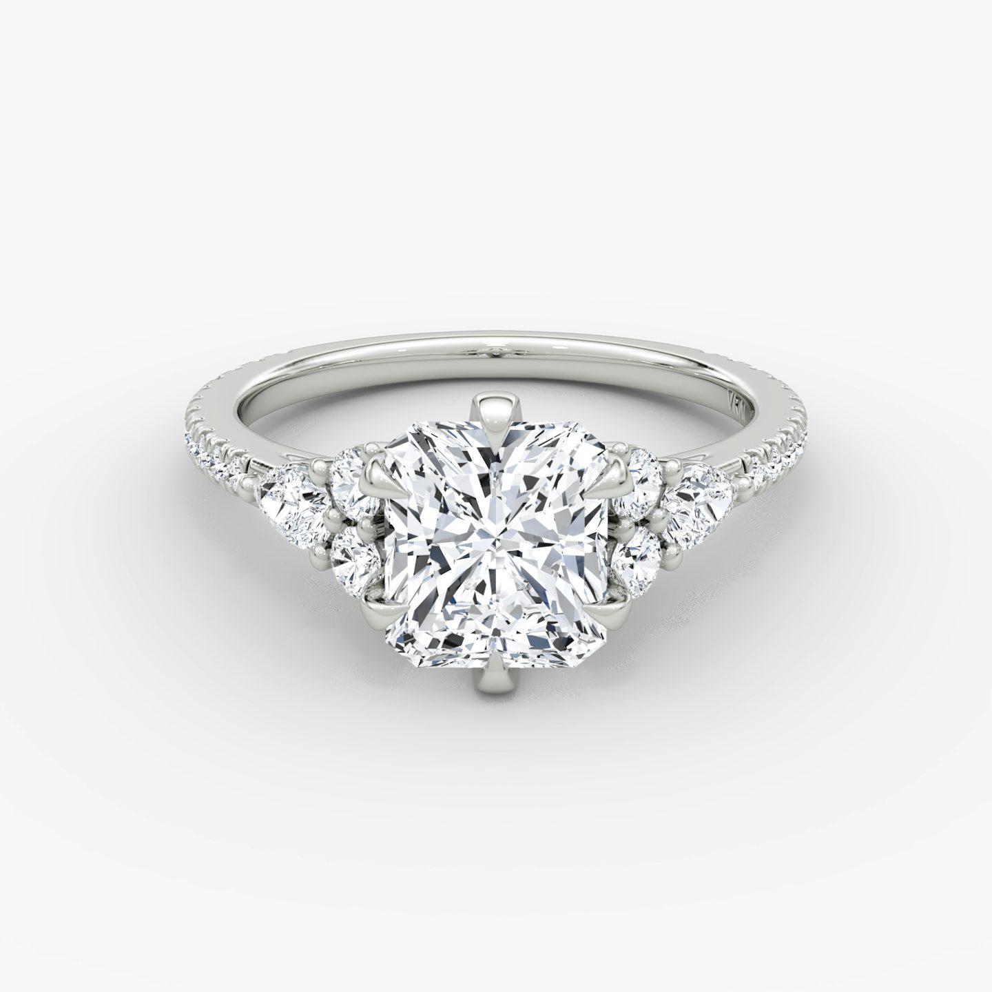 The Pear Cluster Heirloom | Radiant | Platinum | bandAccent: Pavé | diamondOrientation: vertical | caratWeight: other