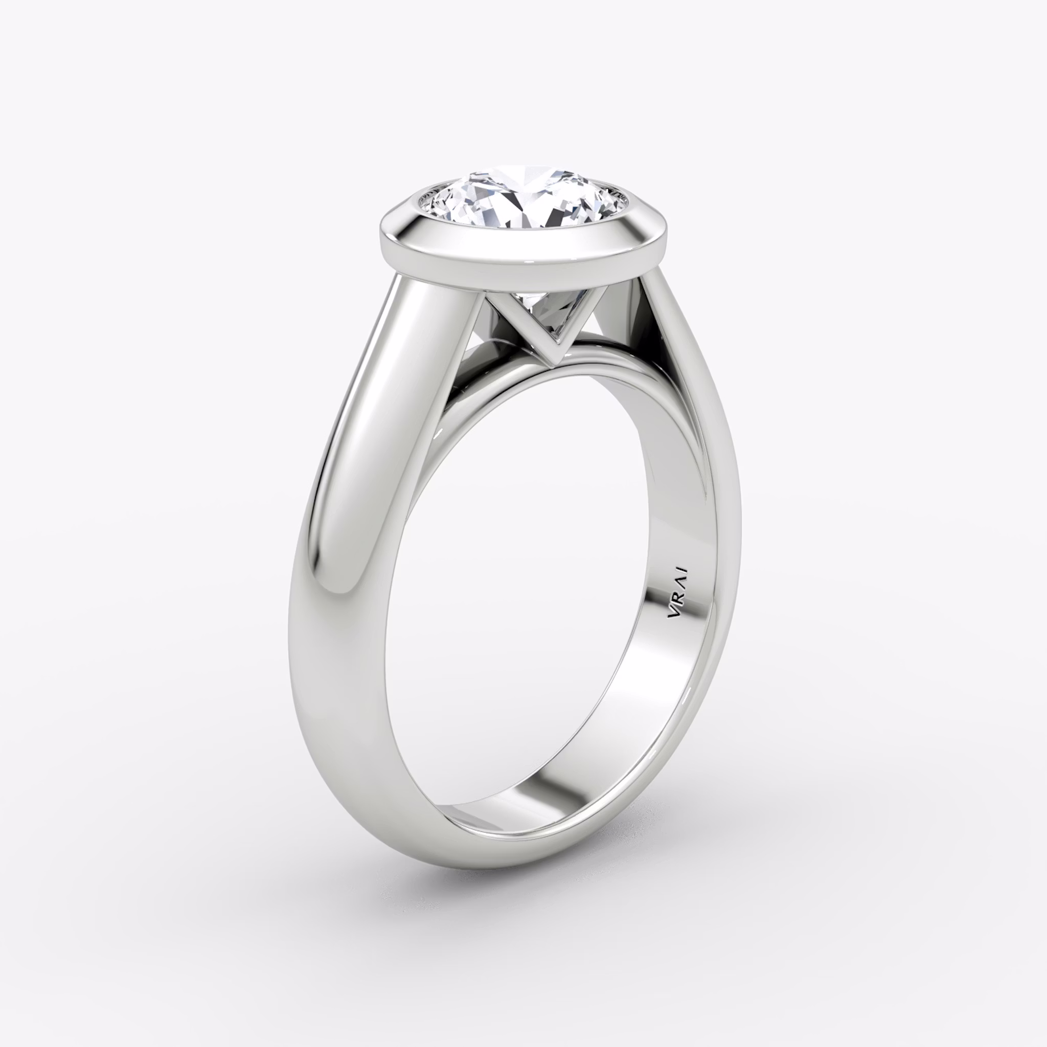 The Sculpture Bezel | Round Brilliant | Platinum | bandAccent: Plain | caratWeight: 1.0ct | diamondOrientation: vertical