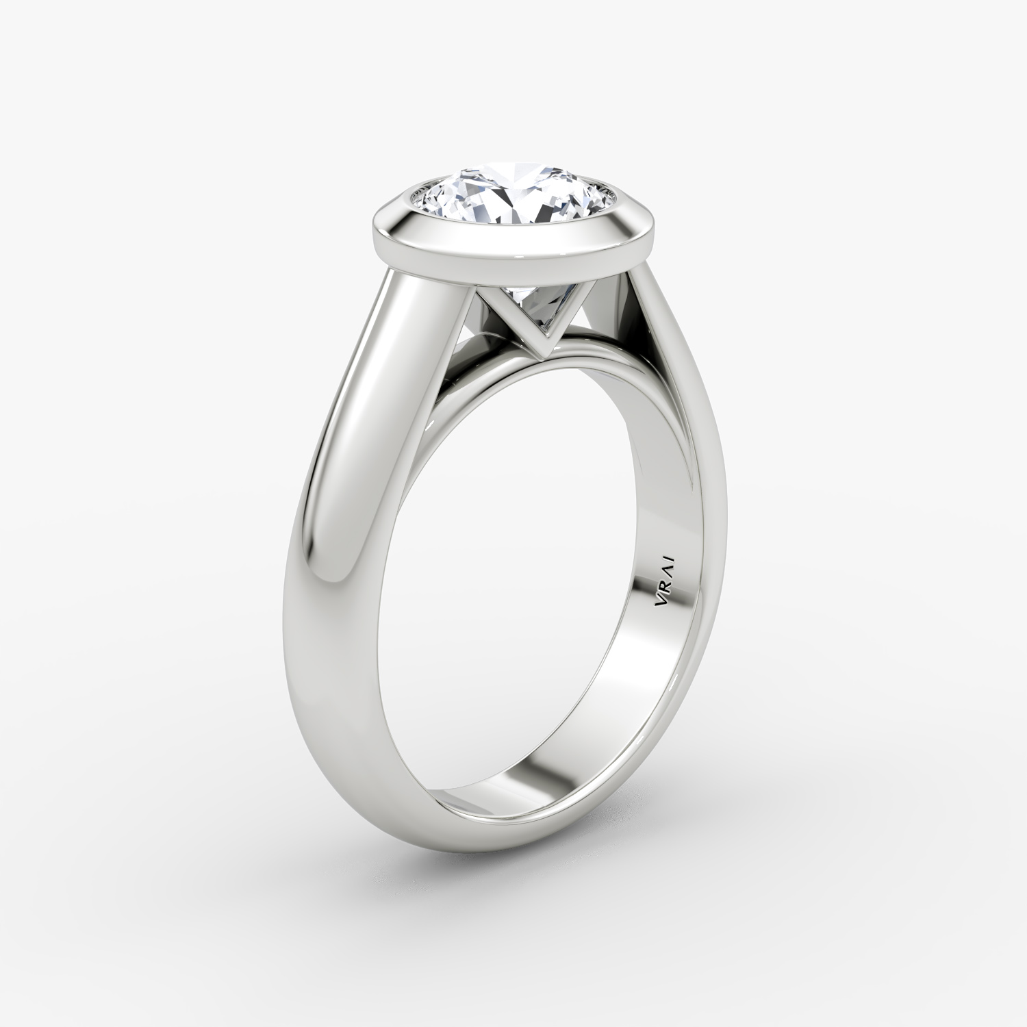 The Sculpture Bezel | Round Brilliant | Platinum | bandAccent: Plain | caratWeight: 1.5ct | diamondOrientation: vertical