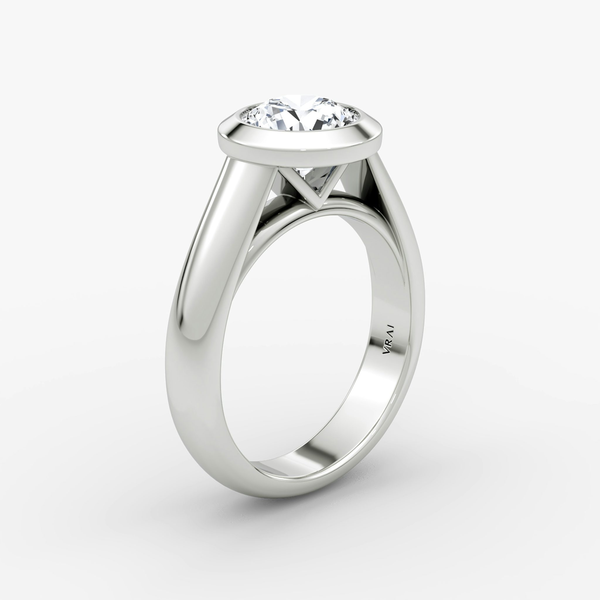 The Sculpture Bezel | Round Brilliant | Platinum | bandAccent: Plain | caratWeight: other | diamondOrientation: vertical